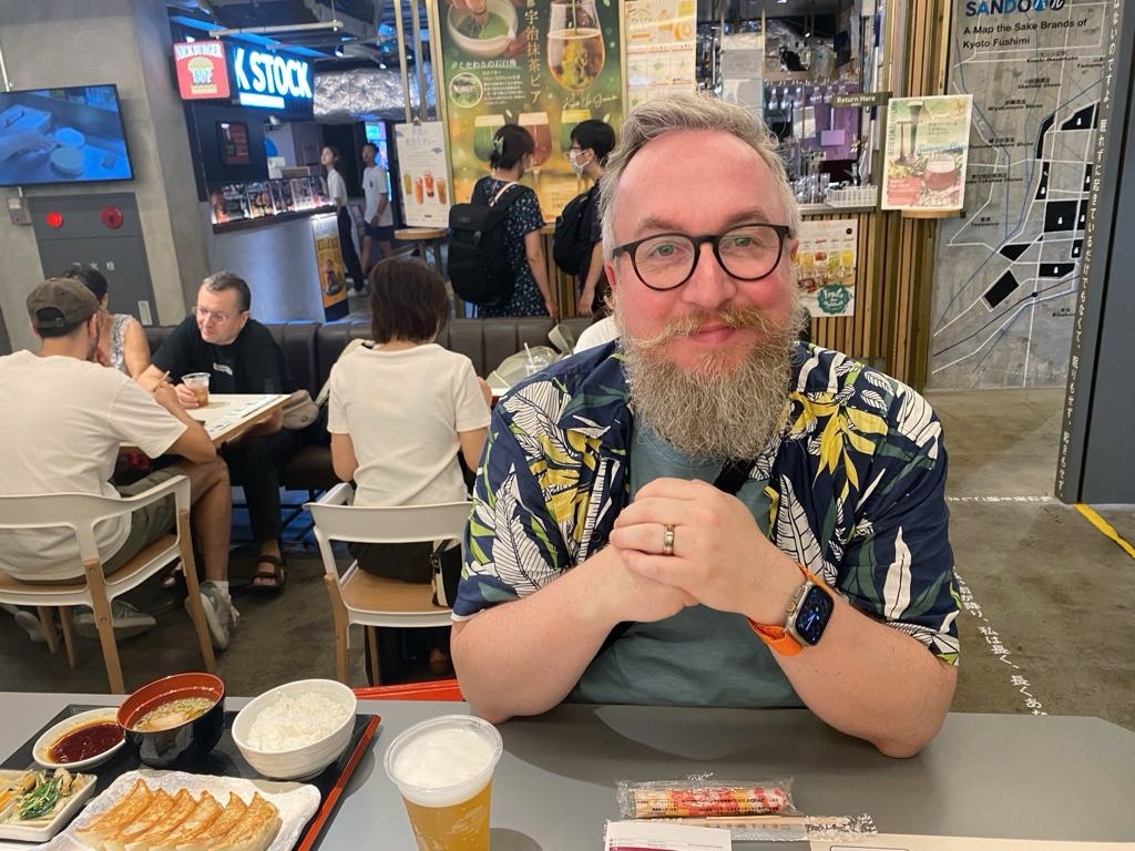 Me waiting for my meal at the food hall in Kyoto Tower