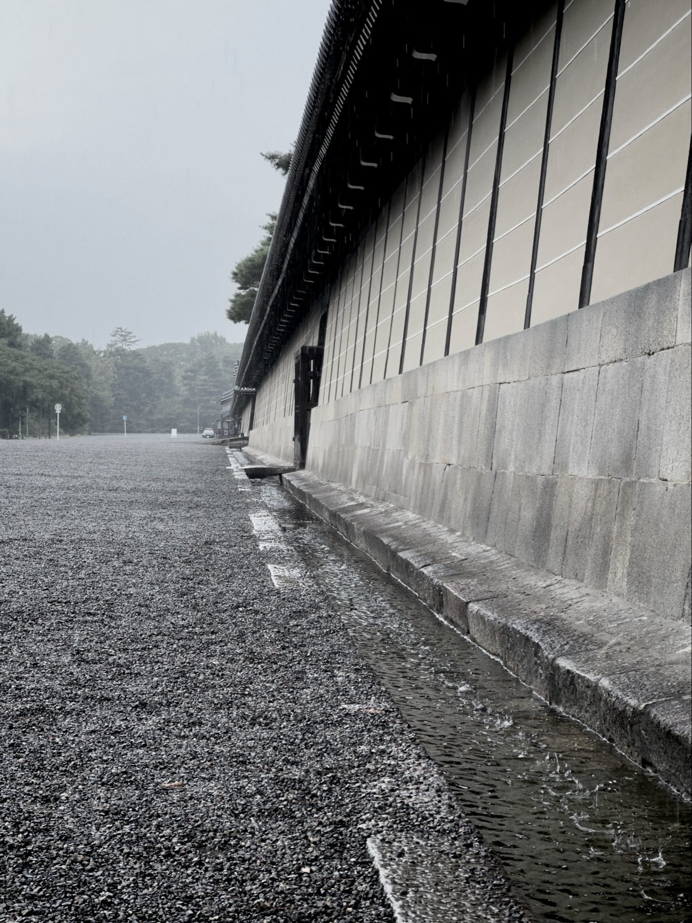 Rain pouring into the small moat of the imperial palace