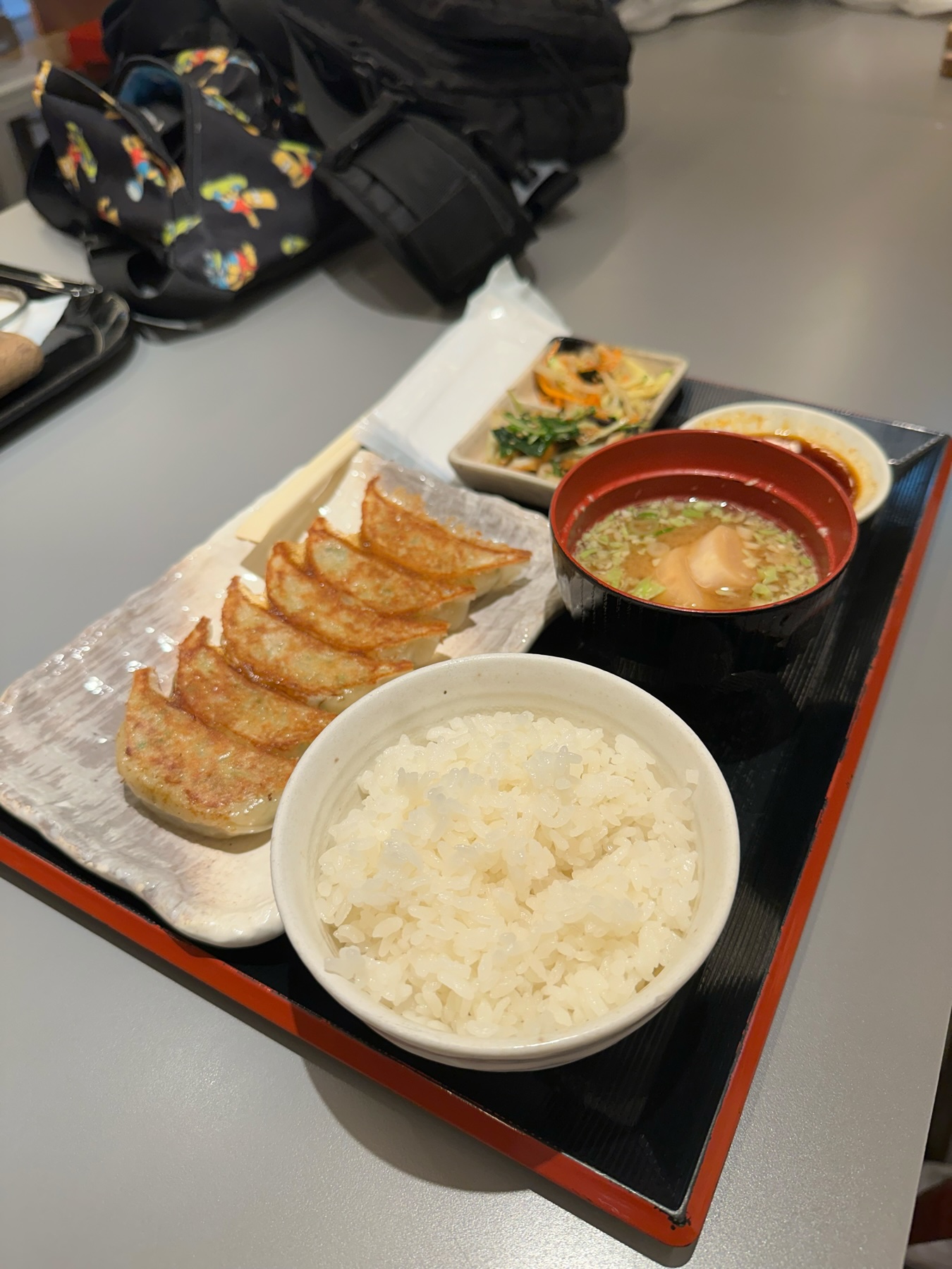 A tray of Gyoza and Rice