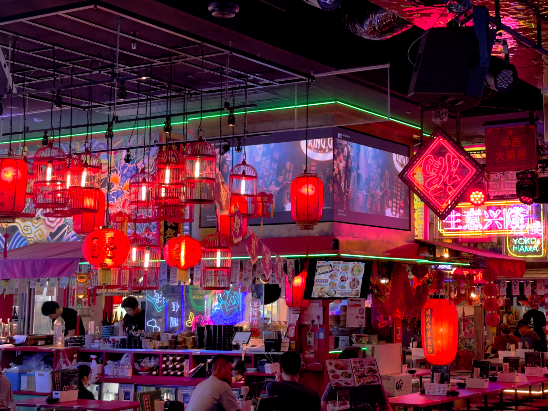 The colourful neon interior of the restaurants in Kabuchicho Tower