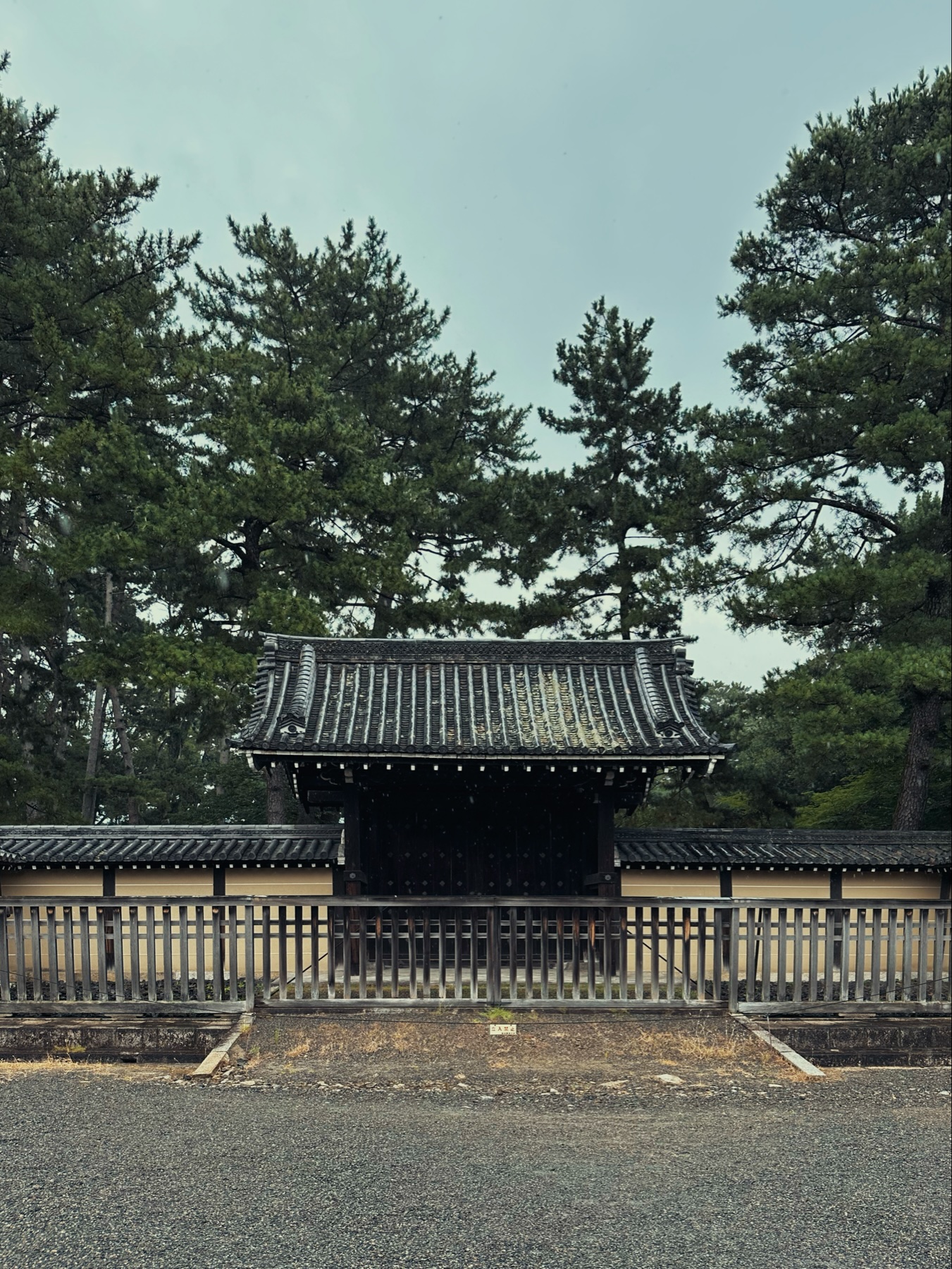 An old Japanese entrance gate at the imperial palace