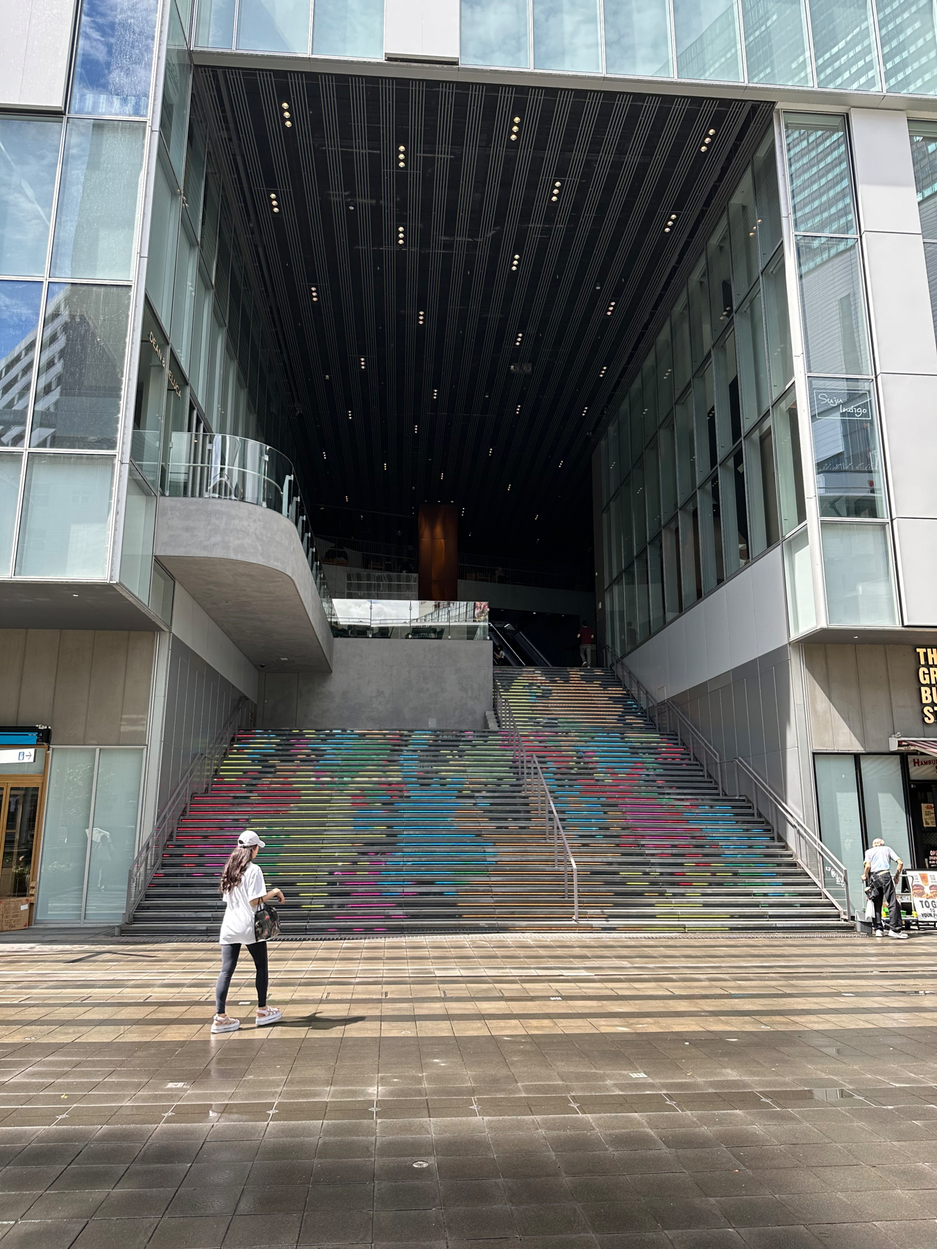The LED steps leading up to Shibuya Stream showing colourful splats of paint