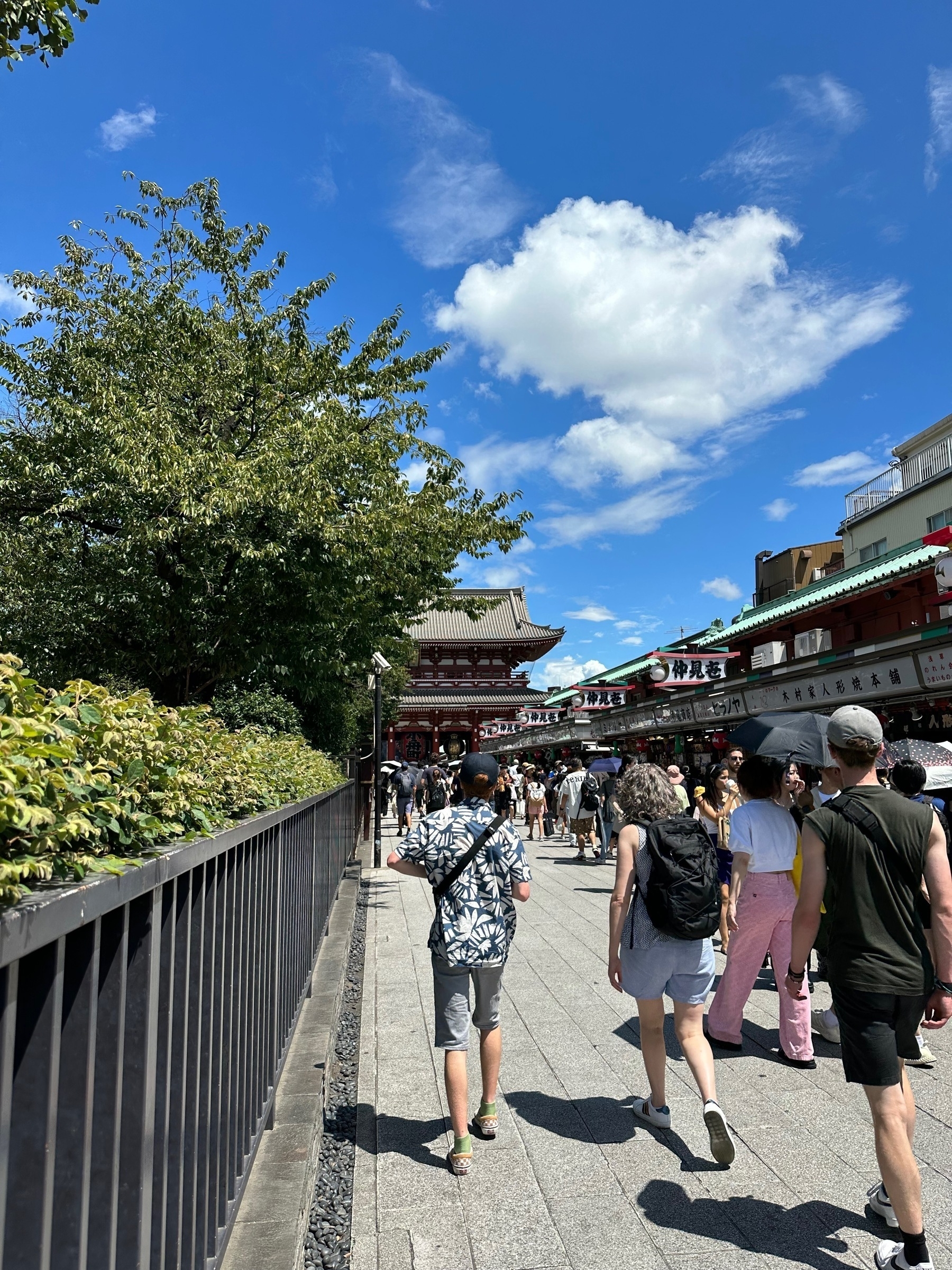 Walking towards Senso-Ji temple on a hot summer day