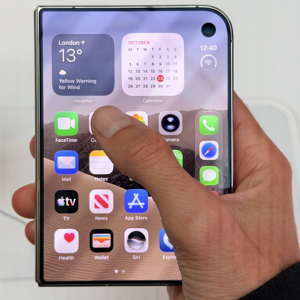 iPhone Duo home screen holding in the right hand