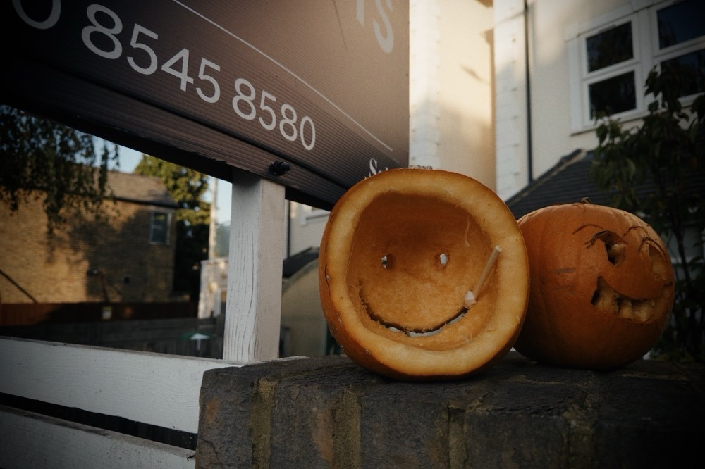 Pumpkin with a smily face and cotton swab