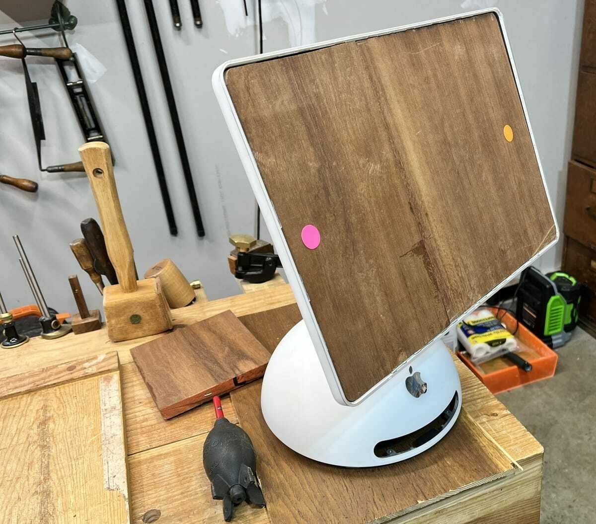a gutted imac G4 with wood in place of screen