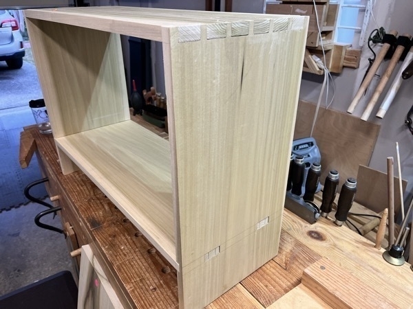 a poplar shelf with dovetails and wedged mortise and tenon