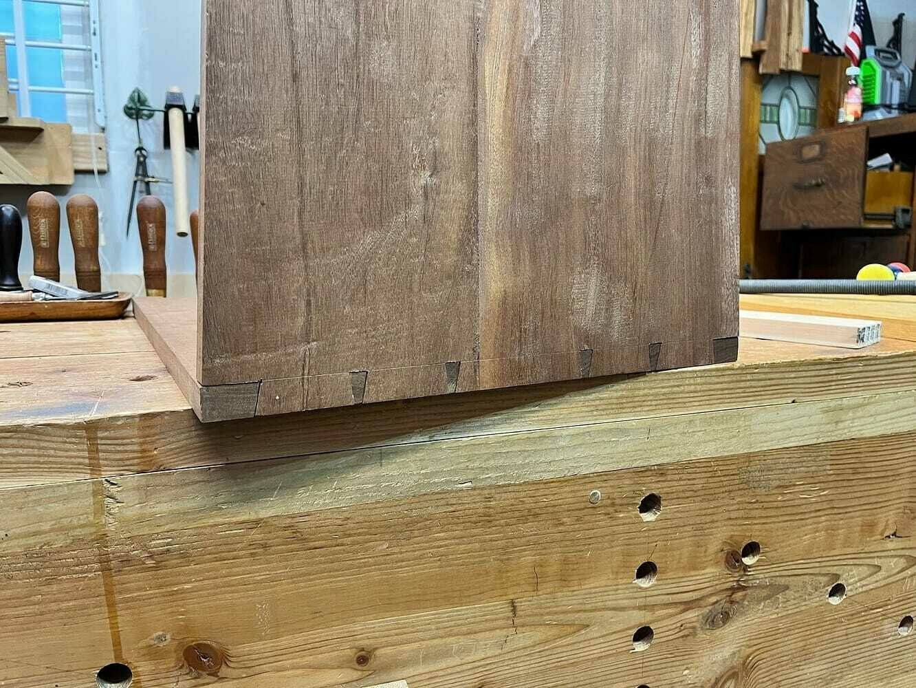 A joined edge showing completed dovetails, dry fit.