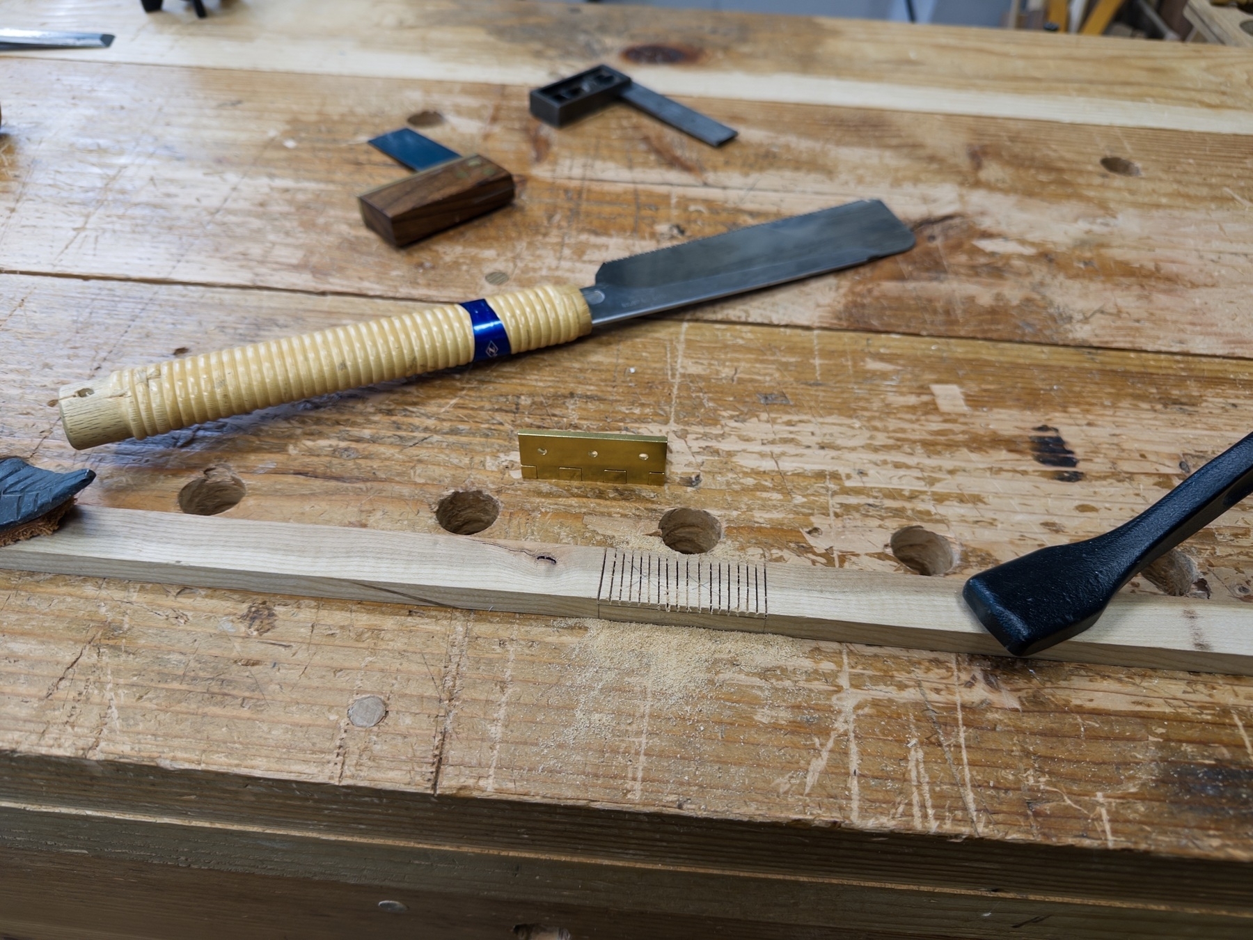 Making mortises for butt hinges with hand tools on a workbench