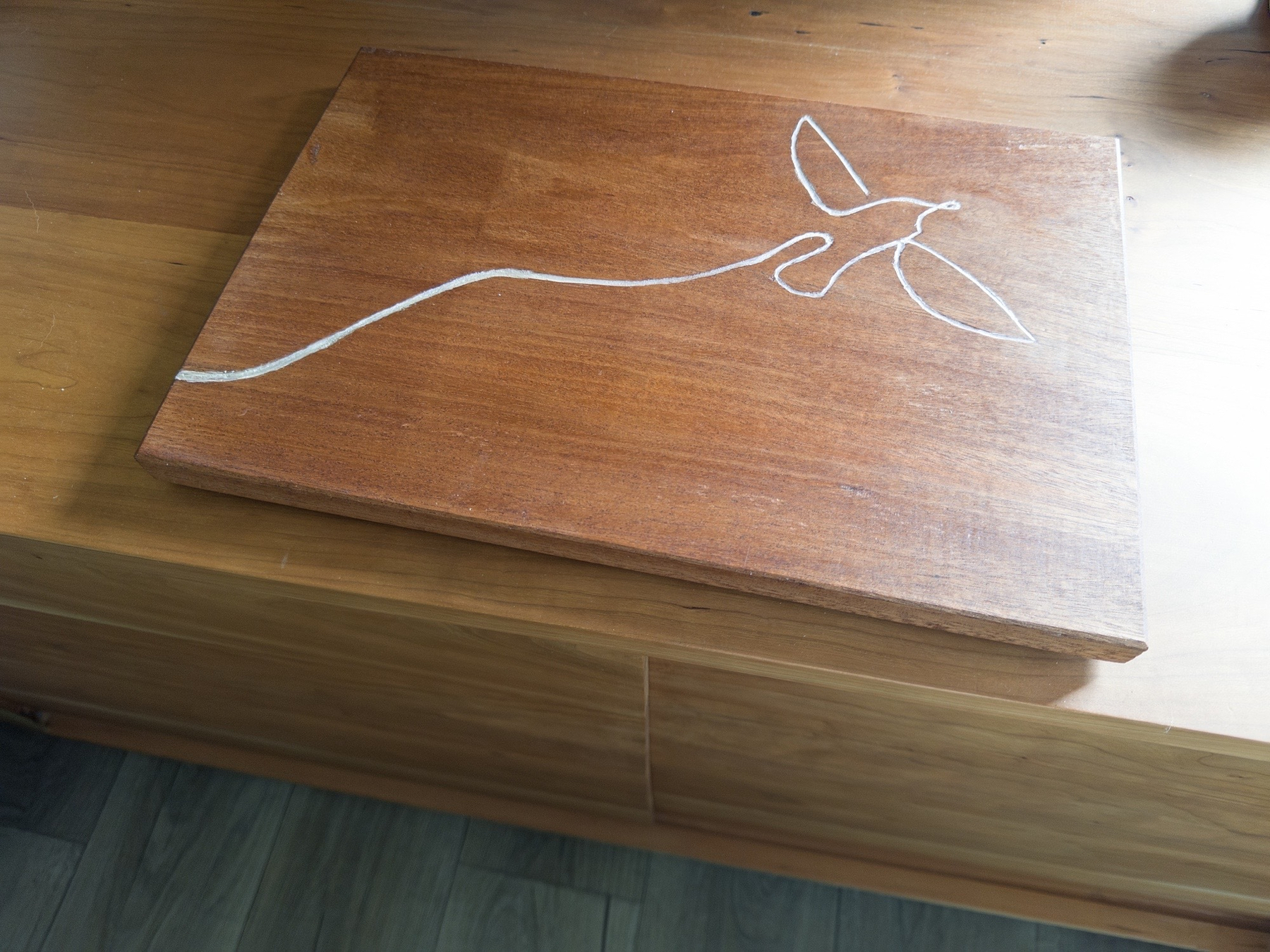 Trivet front, with bird design