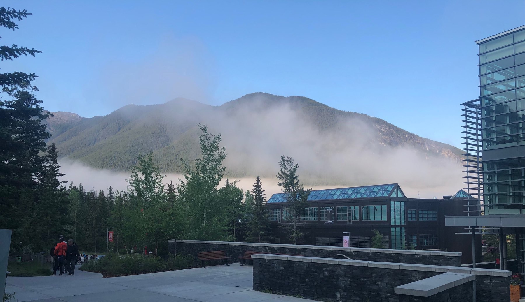 Morning Fog Rising In Front of Mountain.