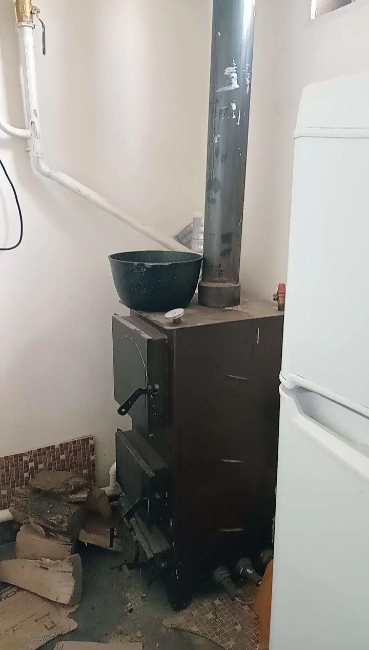 furnace for heating a house in a room