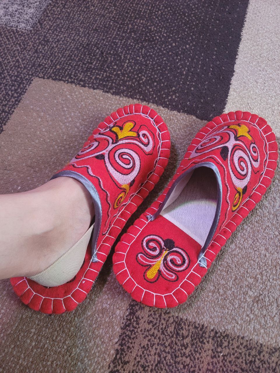 red felt slippers with traditional Kyrgyz motifs embroidered(?) on them