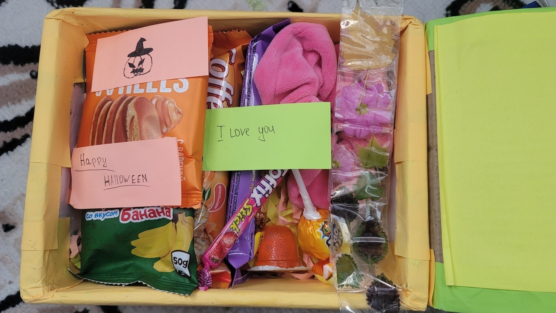 box with sweets and notes