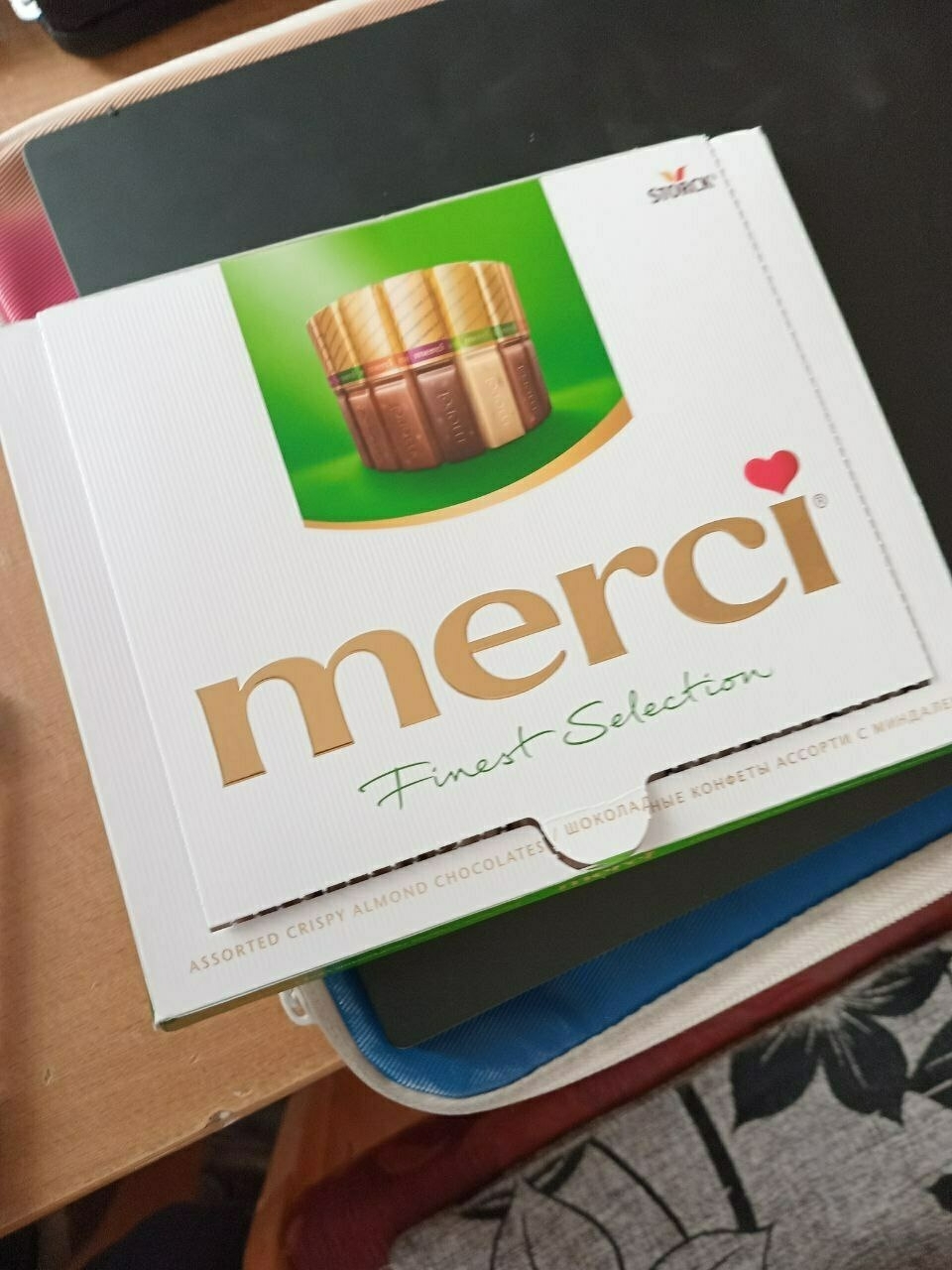 opened box of 16 small Merci chocolates