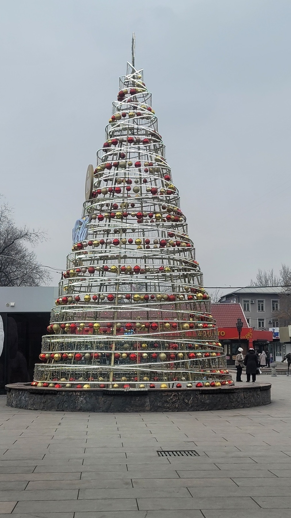 Christmas tree structure made of metal and decorated with ornaments