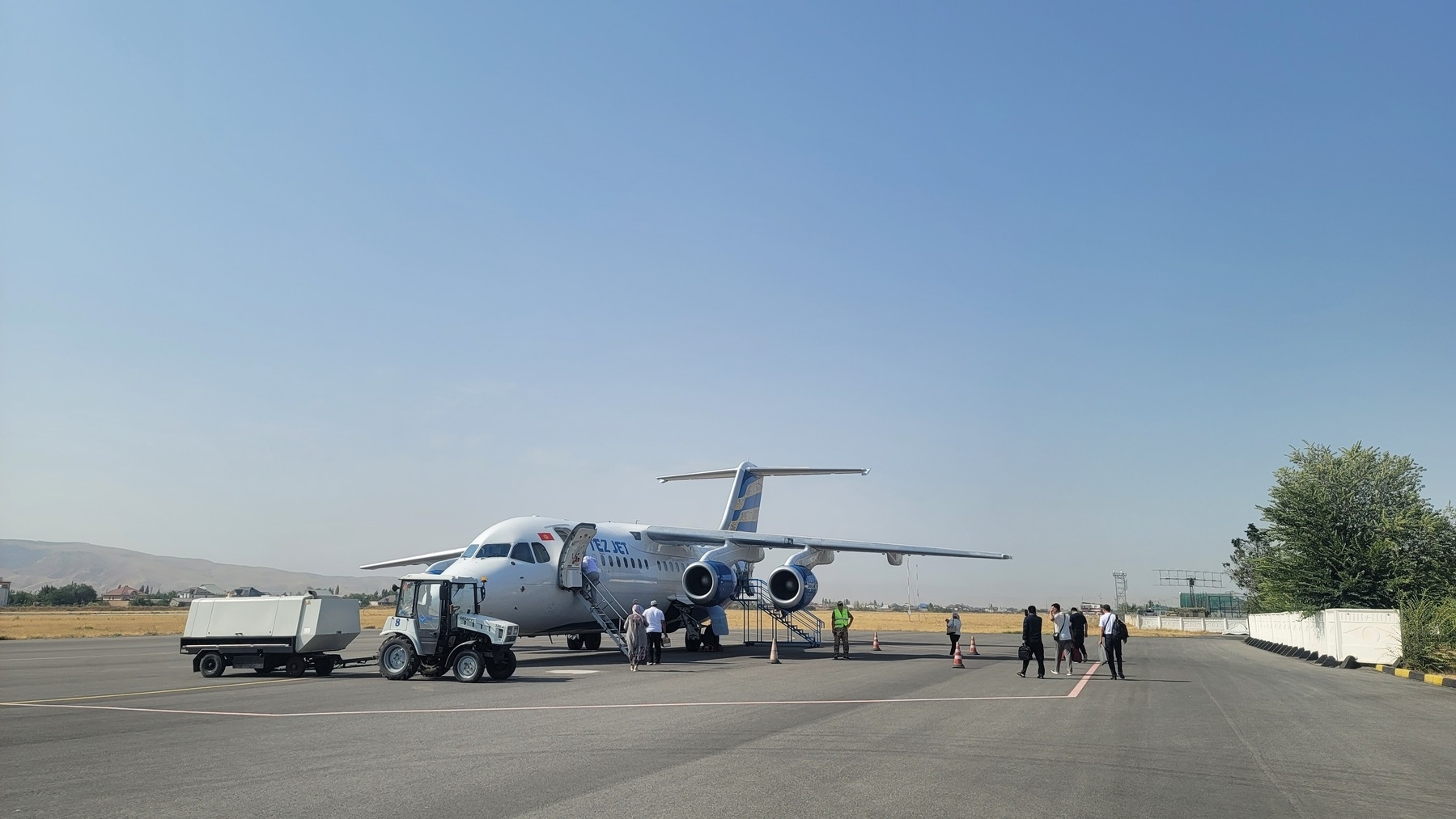 plane with ladders at the front and back for boarding