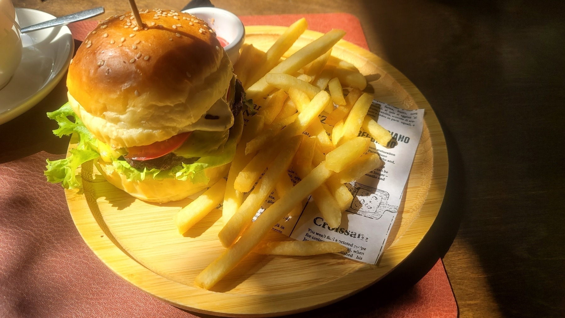burger with fries on a plate