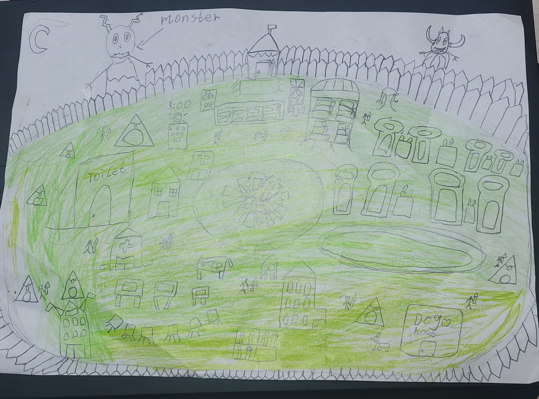 picture of what seems to be a whole camp or amusement park with various parts enclosed inside a fence. There are a few monsters outside of the fence