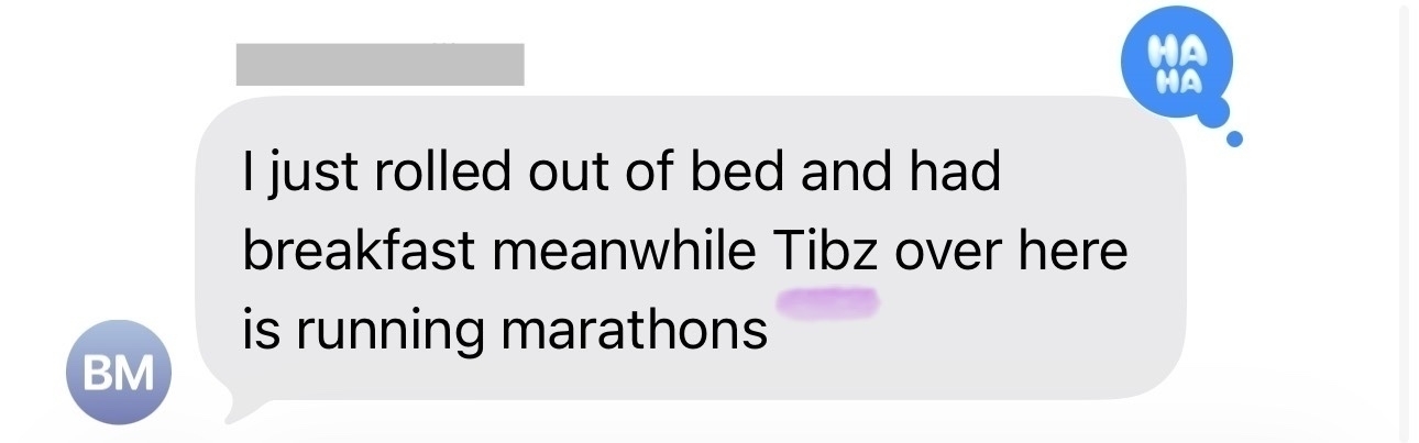 A chat message discusses someone just waking up and having breakfast while another person, Tibz, is running marathons, with a haha reaction above.
