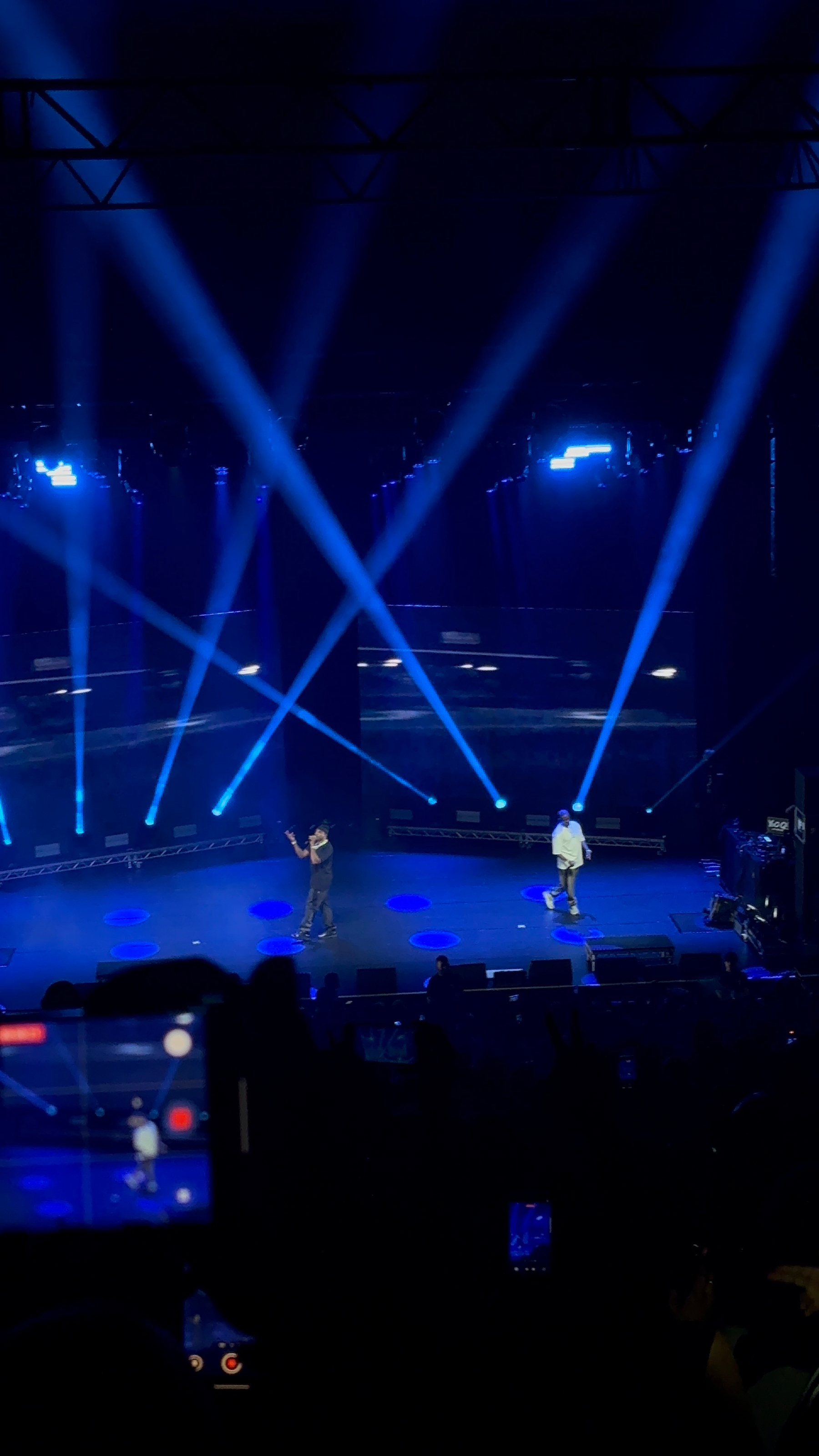 Performers are on stage with two large screens displaying the messages THE LORD WILL MAKE YOU and THE HEAD NOT THE TAIL, set against a backdrop of clouds.