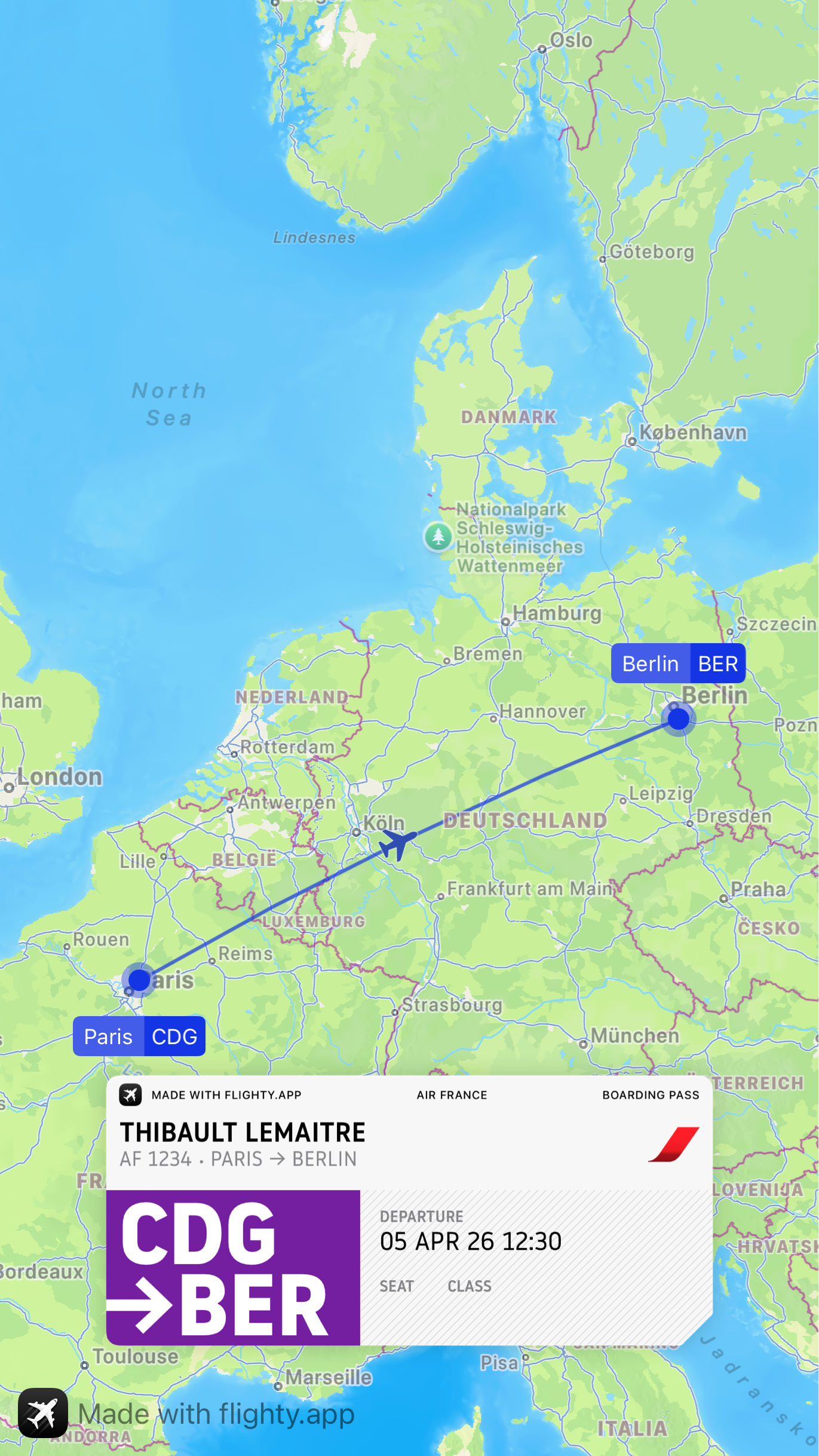 Auto-generated description: A map shows a flight path from Paris (CDG) to Berlin (BER) with travel details for Thibault Lemaitre.