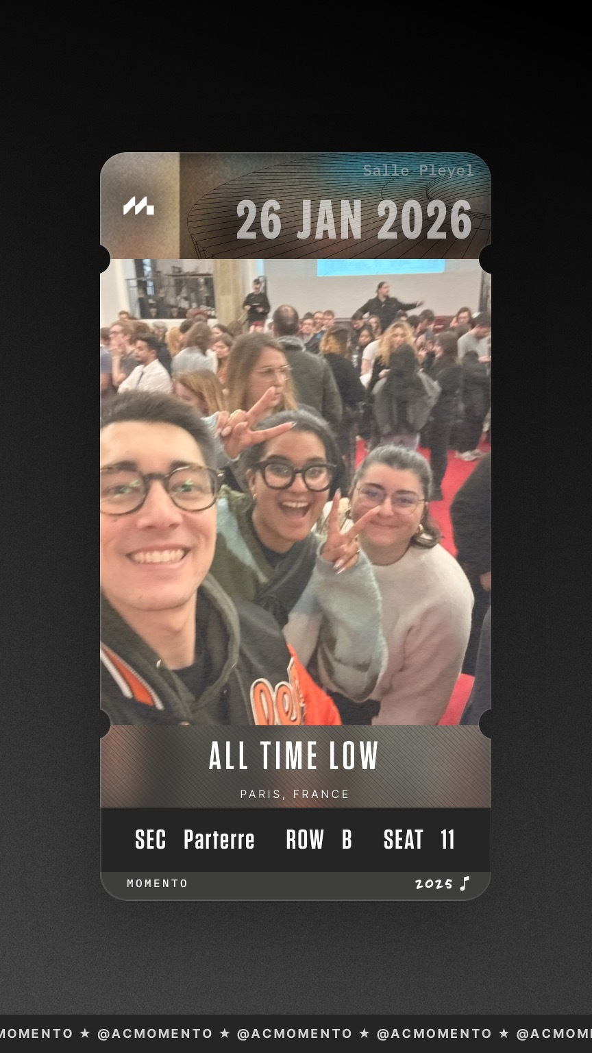 A group of people are taking a selfie in a crowded indoor setting, with a digital ticket overlay for a January 26, 2026 event in Paris.