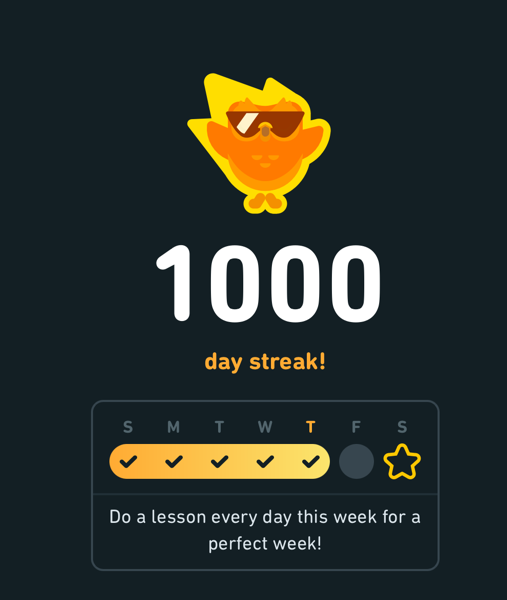 A screenshot of the duolingo web app showing off the 1000 day streak 