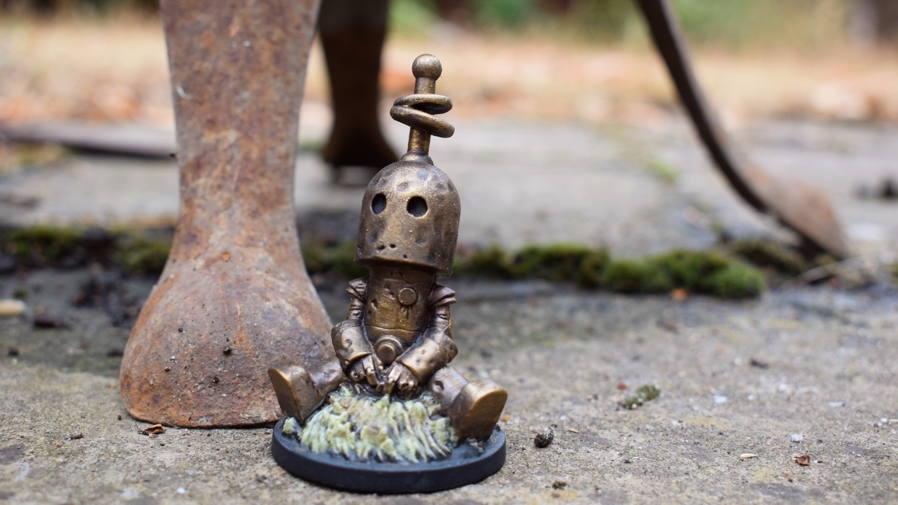 a melancholy rusty robot alone in a rusty landscape 
