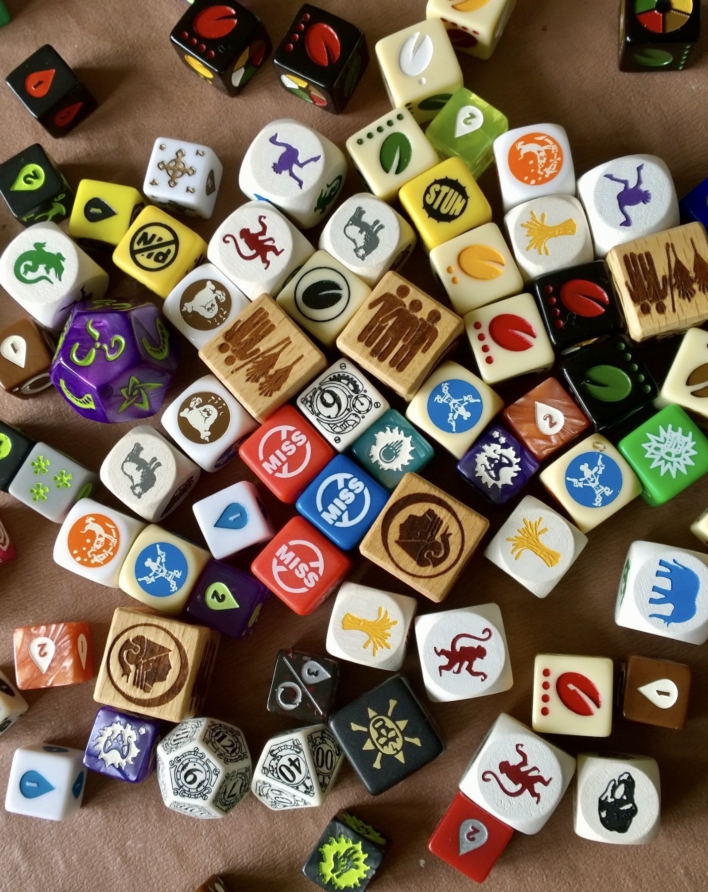 a spread of dice from many differenf board games 
