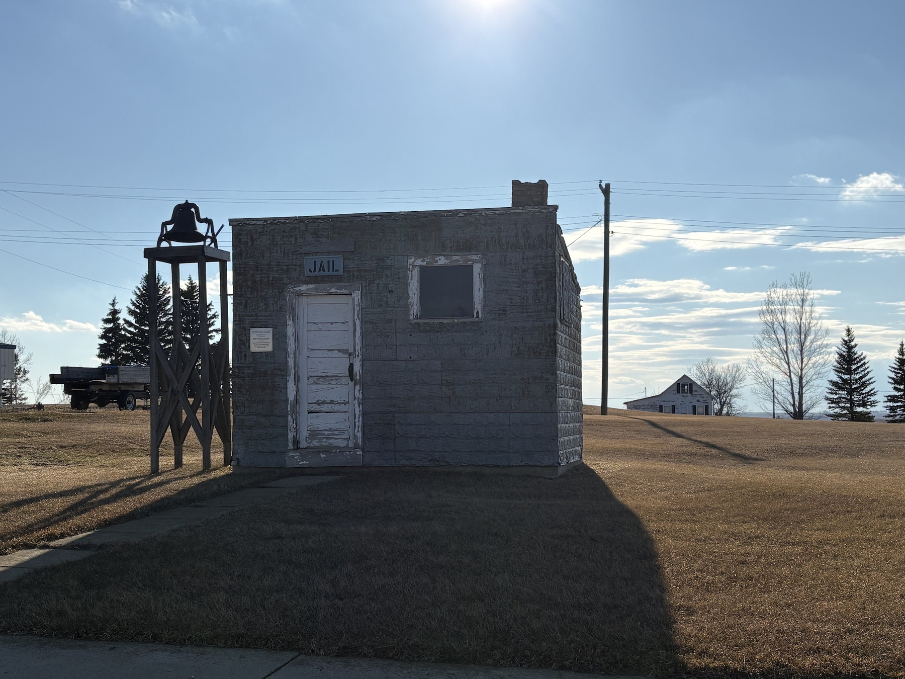 Jail in Benedict, ND. Very, very small run-down building with a sign above the door that says jail in capital letters.