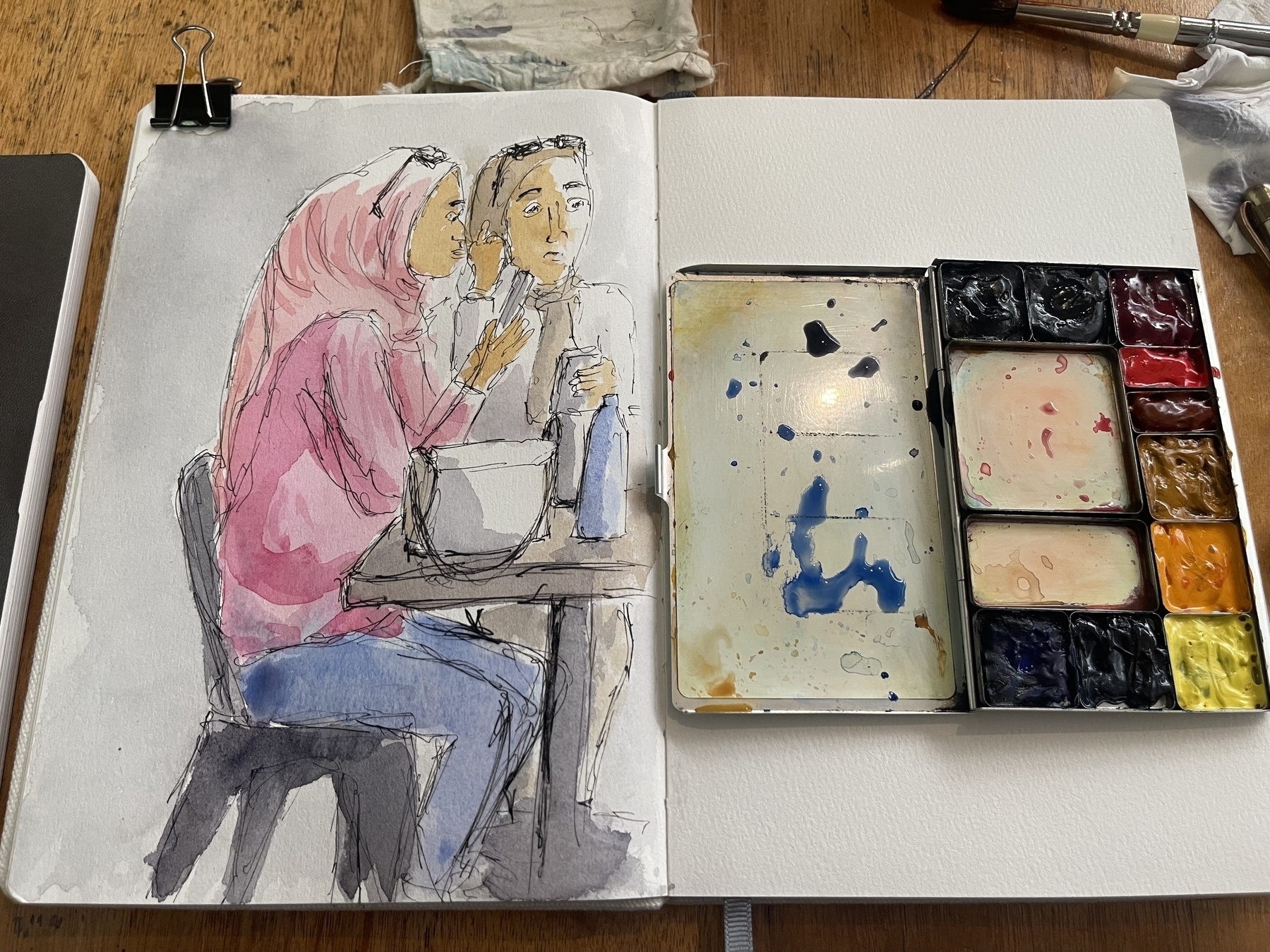 A watercolour painting of two women on their phones