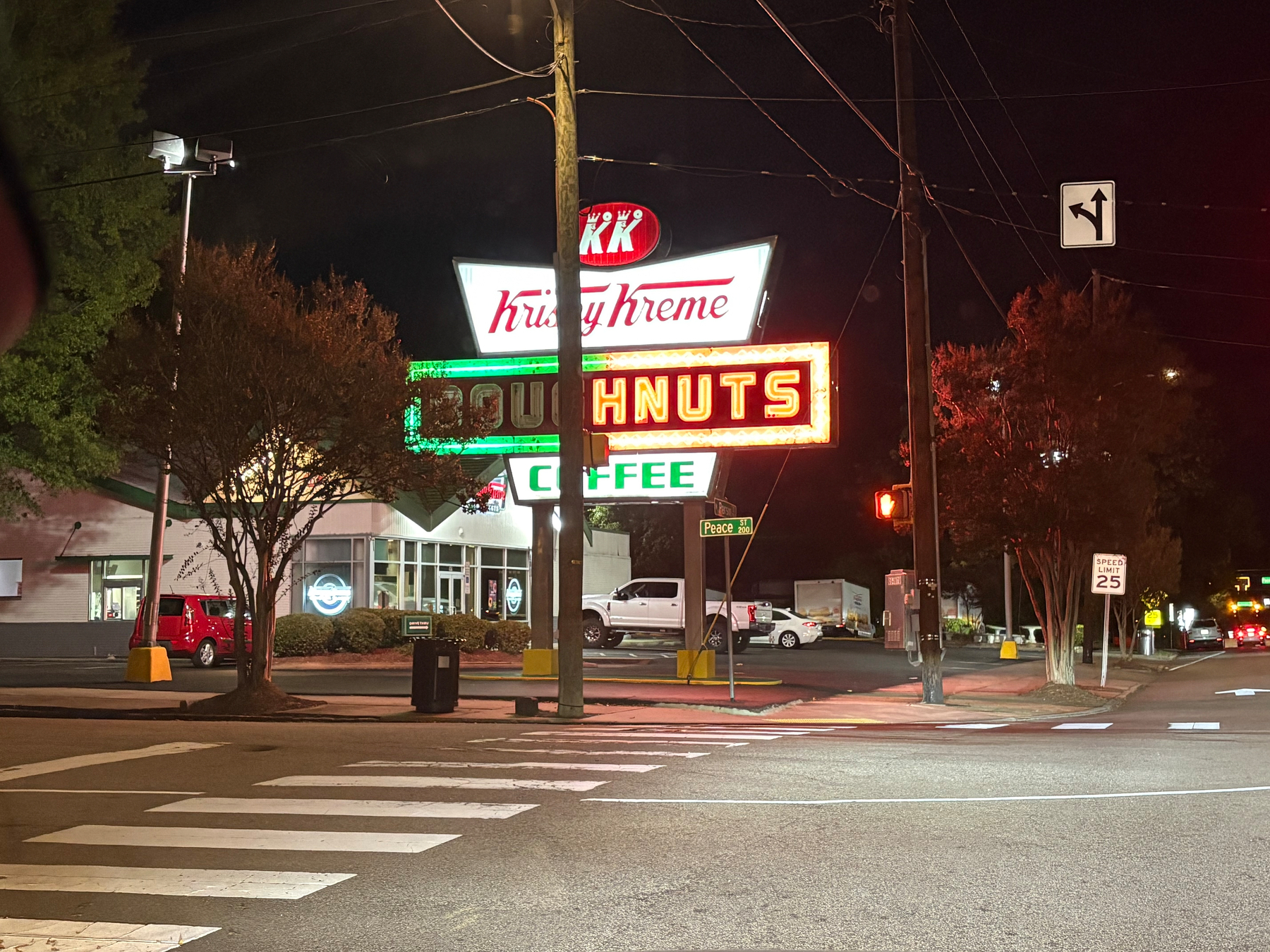 Kristy Kreme sign with only HNUTS lit up