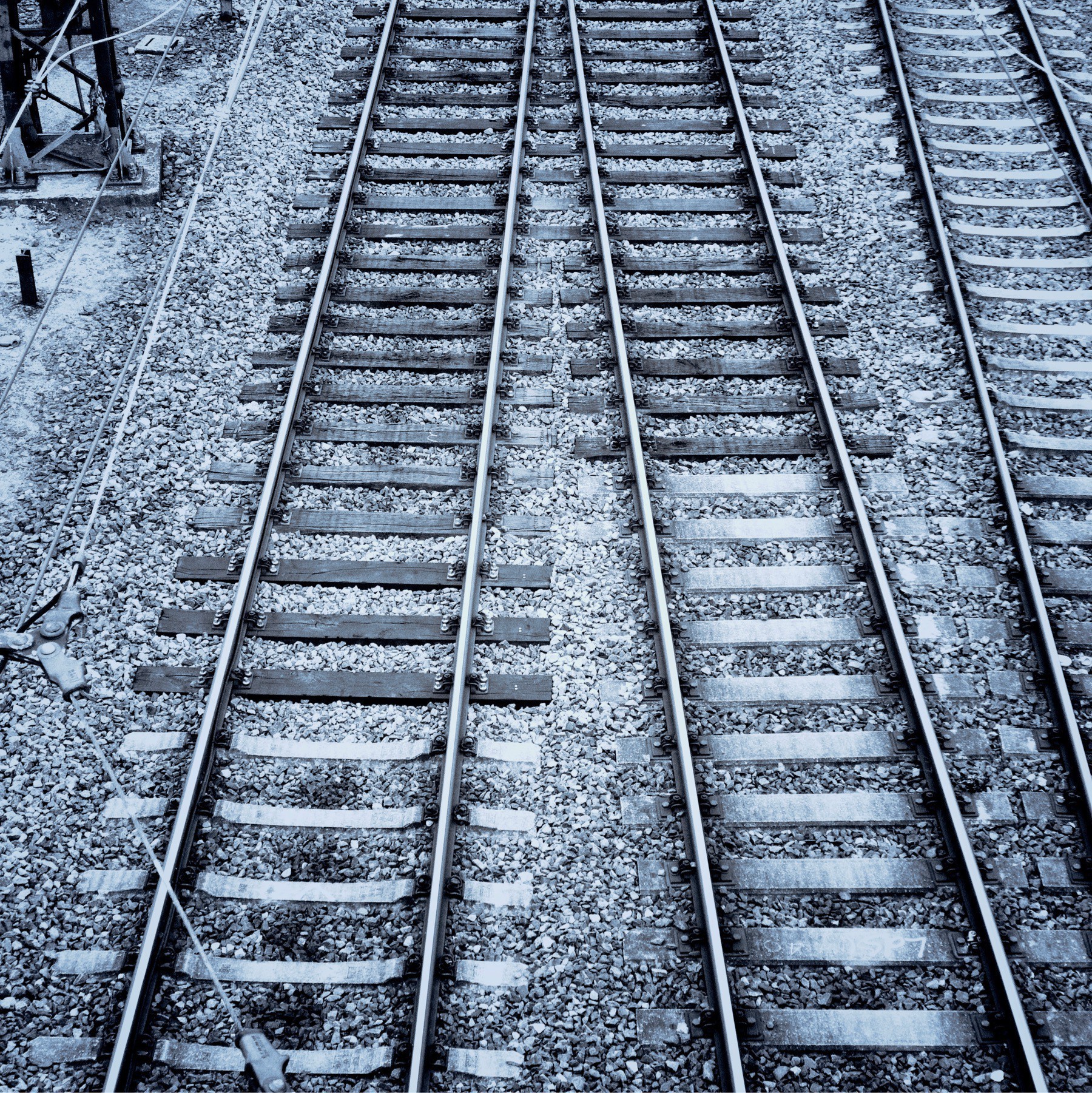 Black and White photo of train tracks.
