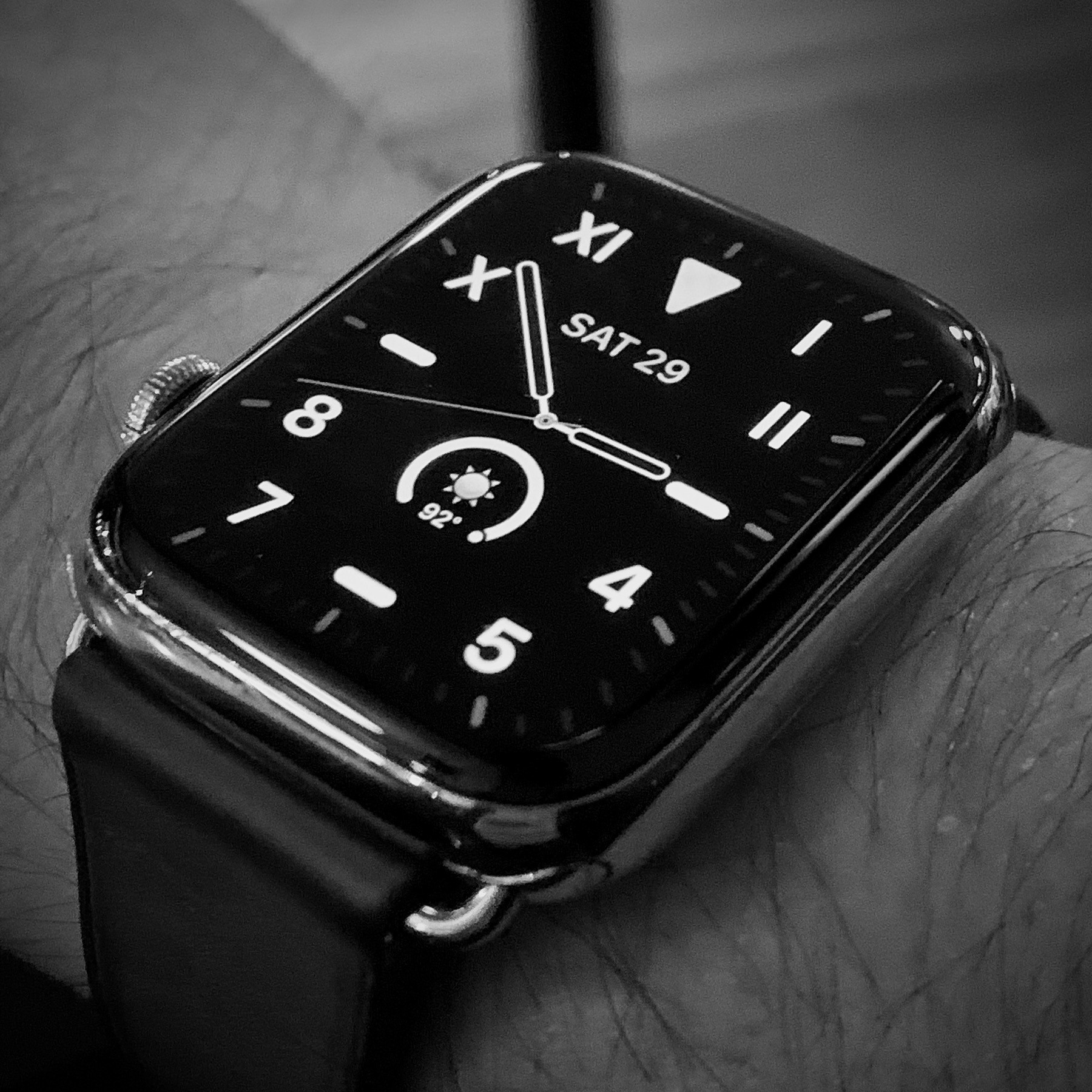 Apple Watch on wrist with California watch face, showing 2:53 pm. 