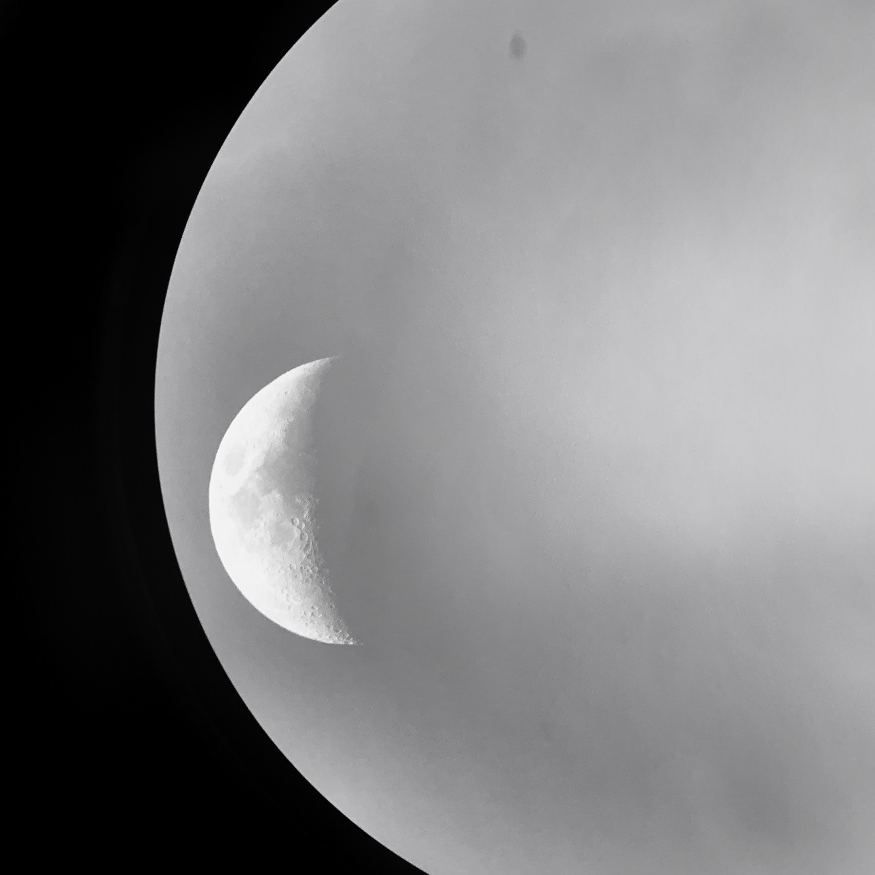 The Moon through a telescope.