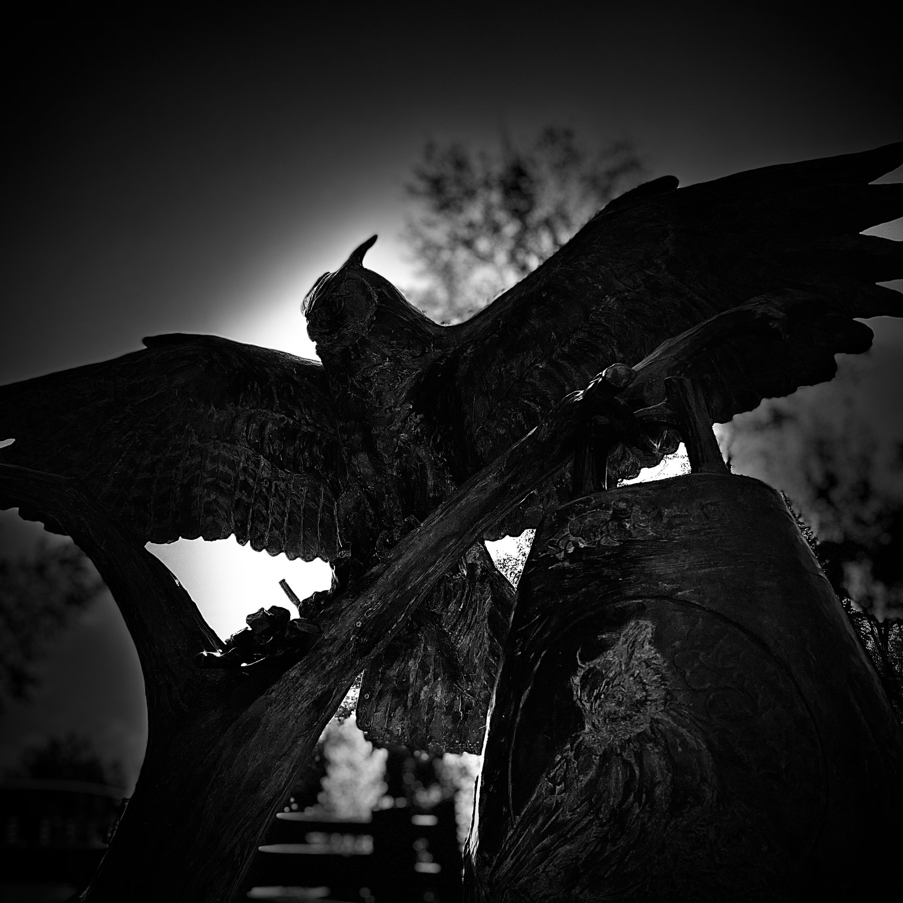 Owl statue, black and white.