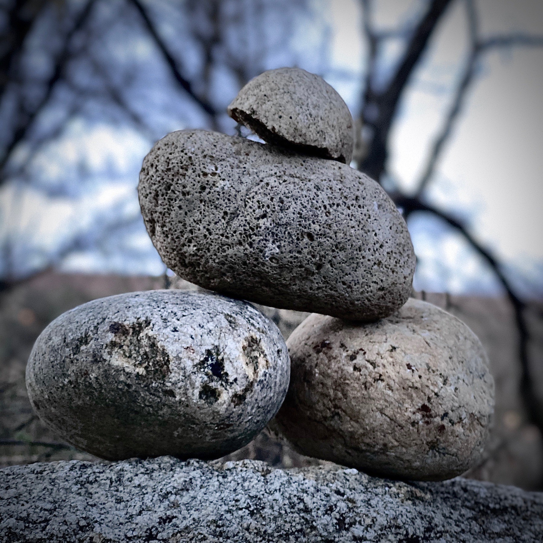 Rounded stones arranged on top of one another.