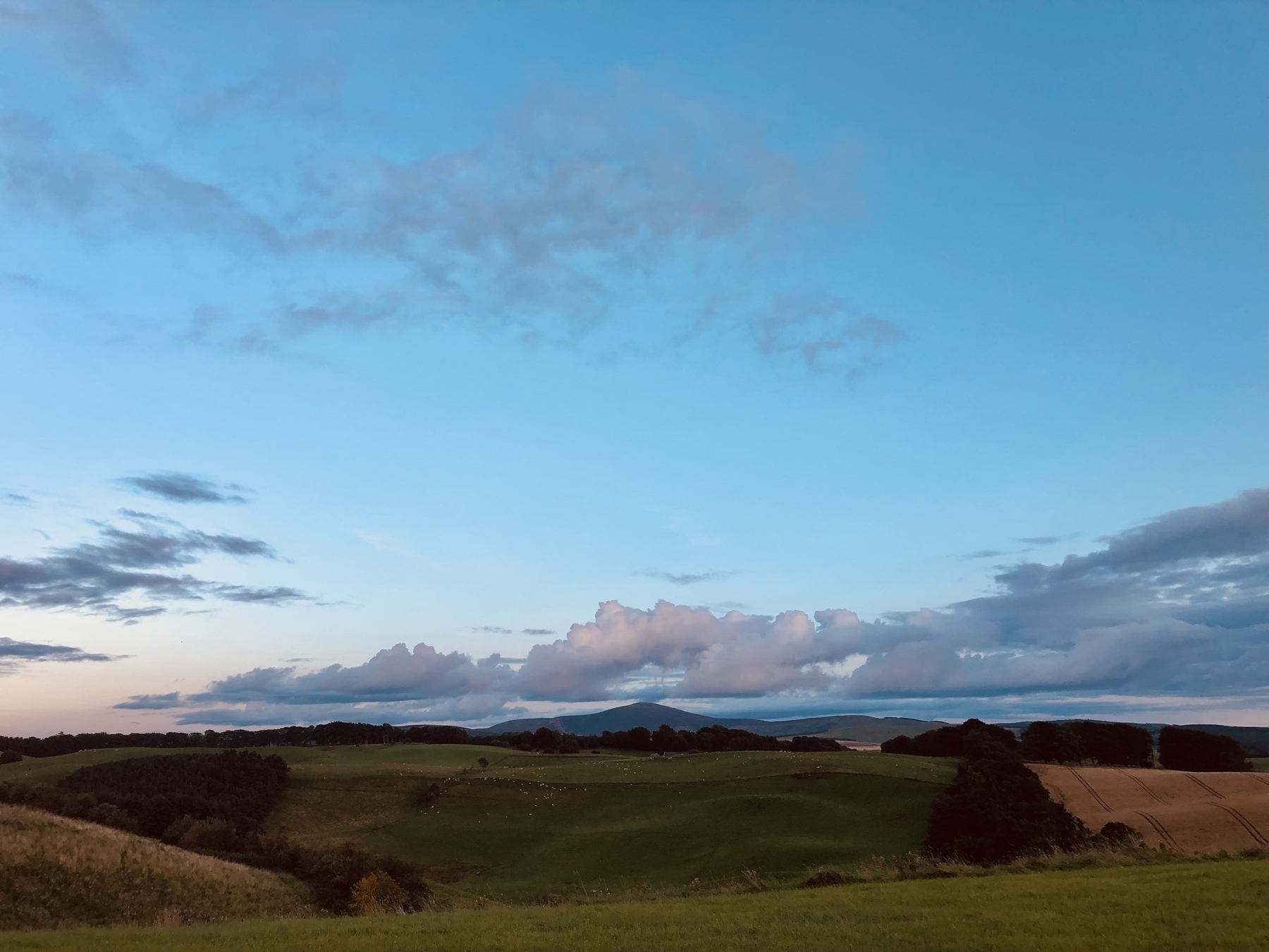 Scottish countryside at dusk with Tinto Hill in the middle of the shot