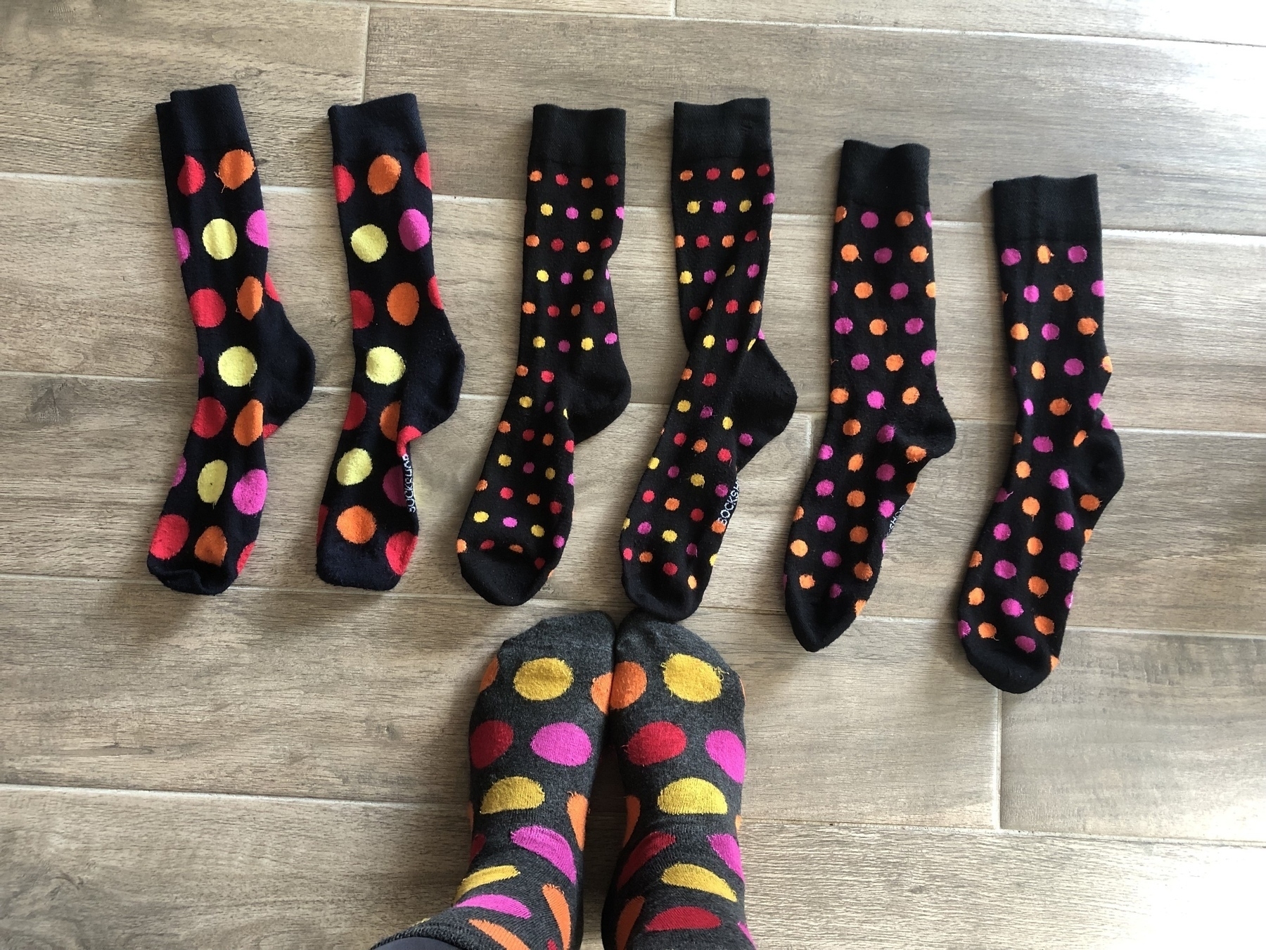 A row of colourful, spotty socks