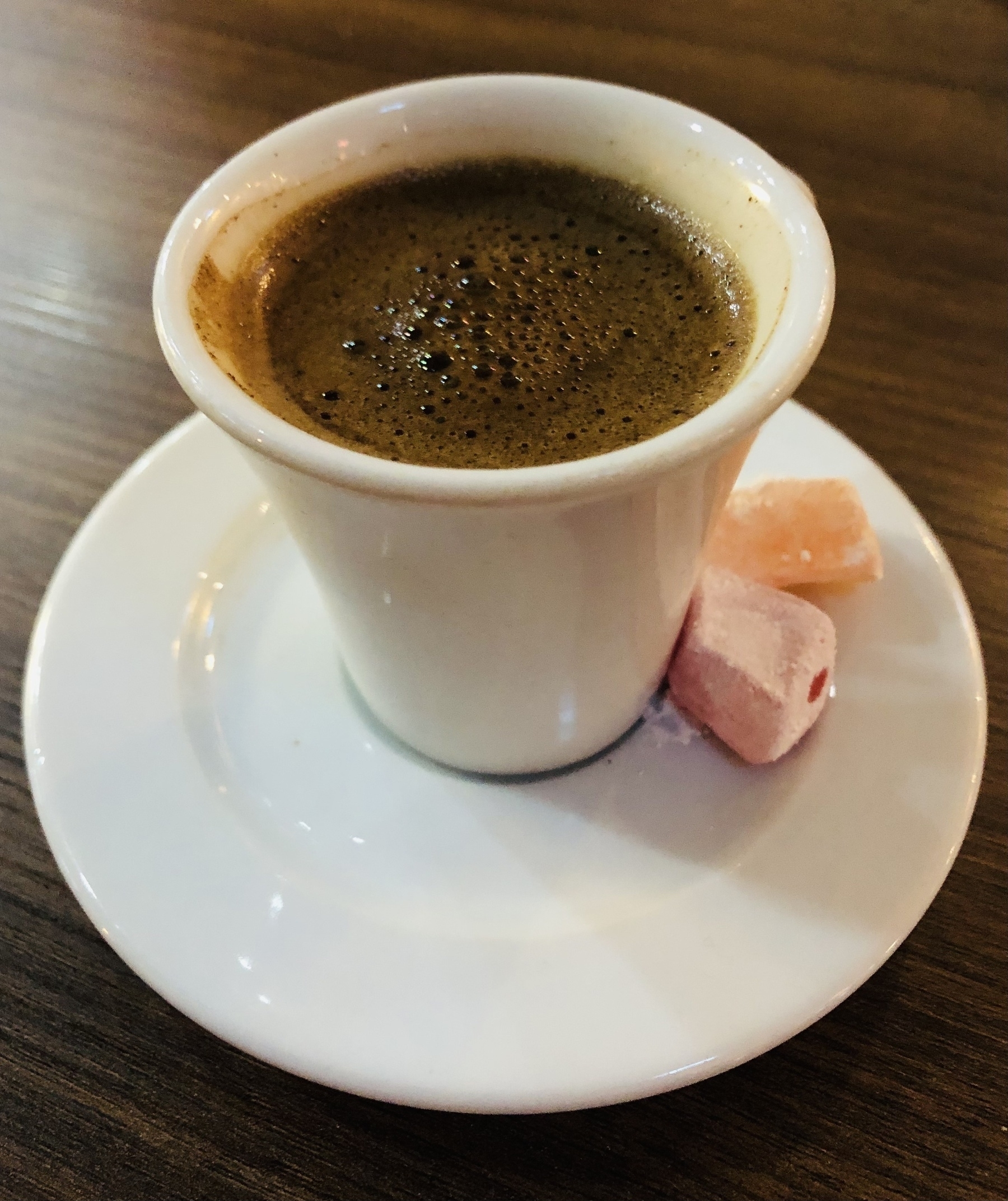 Turkish cup of coffee with a side of Turkish delight