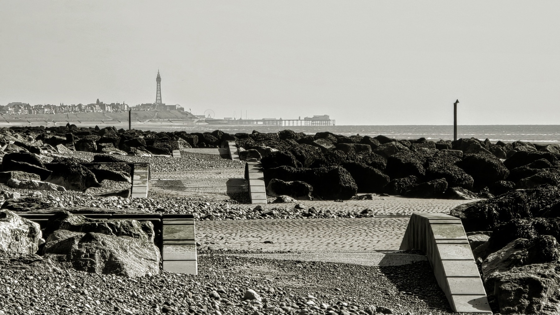 b/w image of Blackpool tower and surrounding coast taken from the north