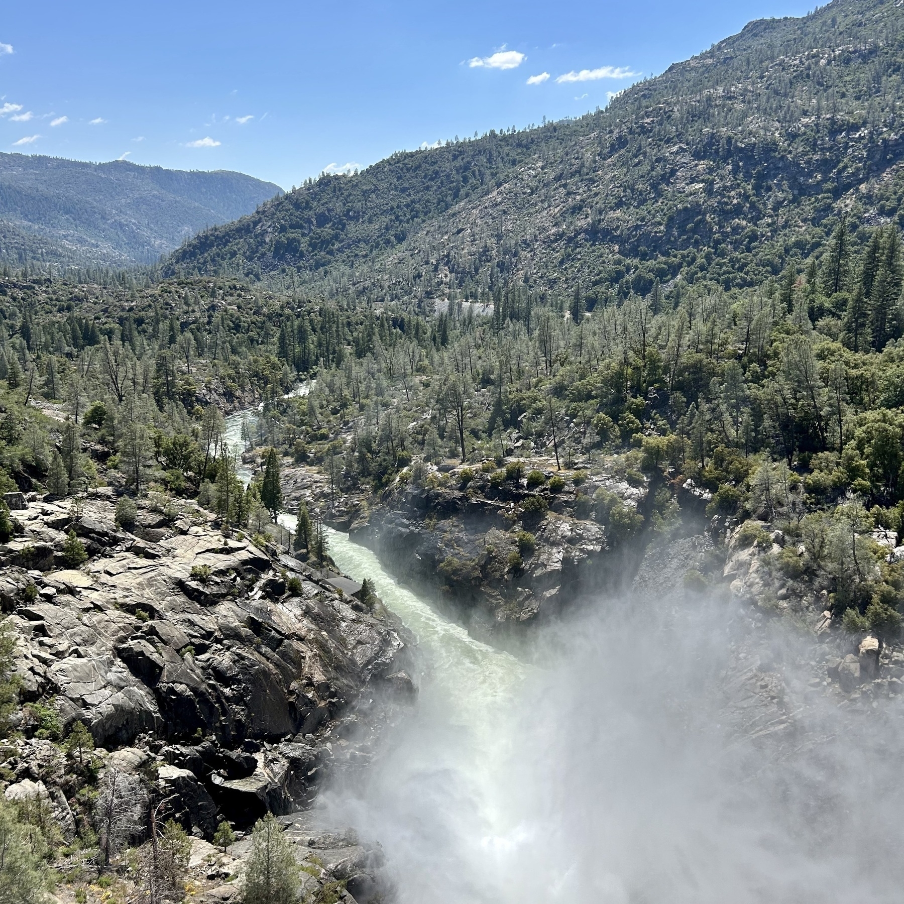 a view of water flowing from the dam at Hetch Hetchy in Yosemite National Park