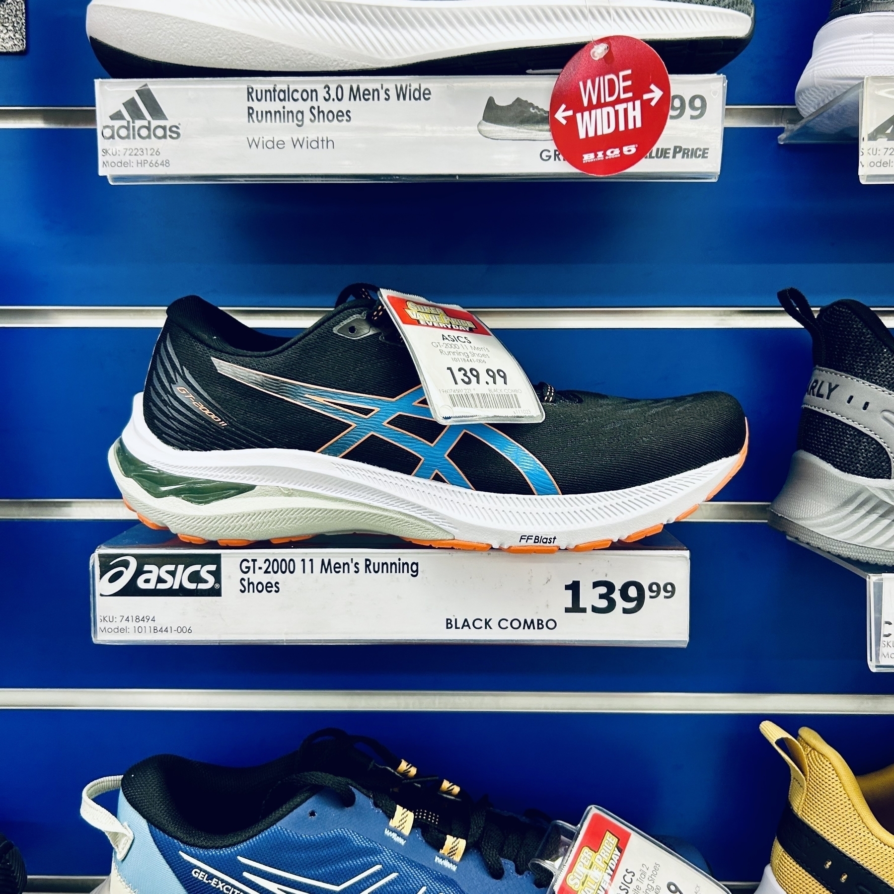 A running shoe on display at a store.