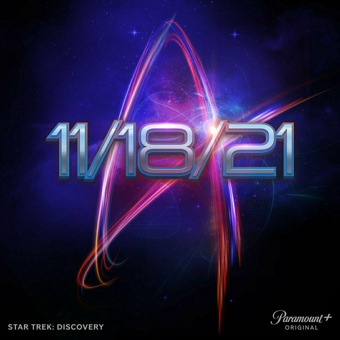 Stylised Star Trek communicator badge outline overlayed with the date 11.18.21 for the start of the fourth season of Star Trek Discovery.