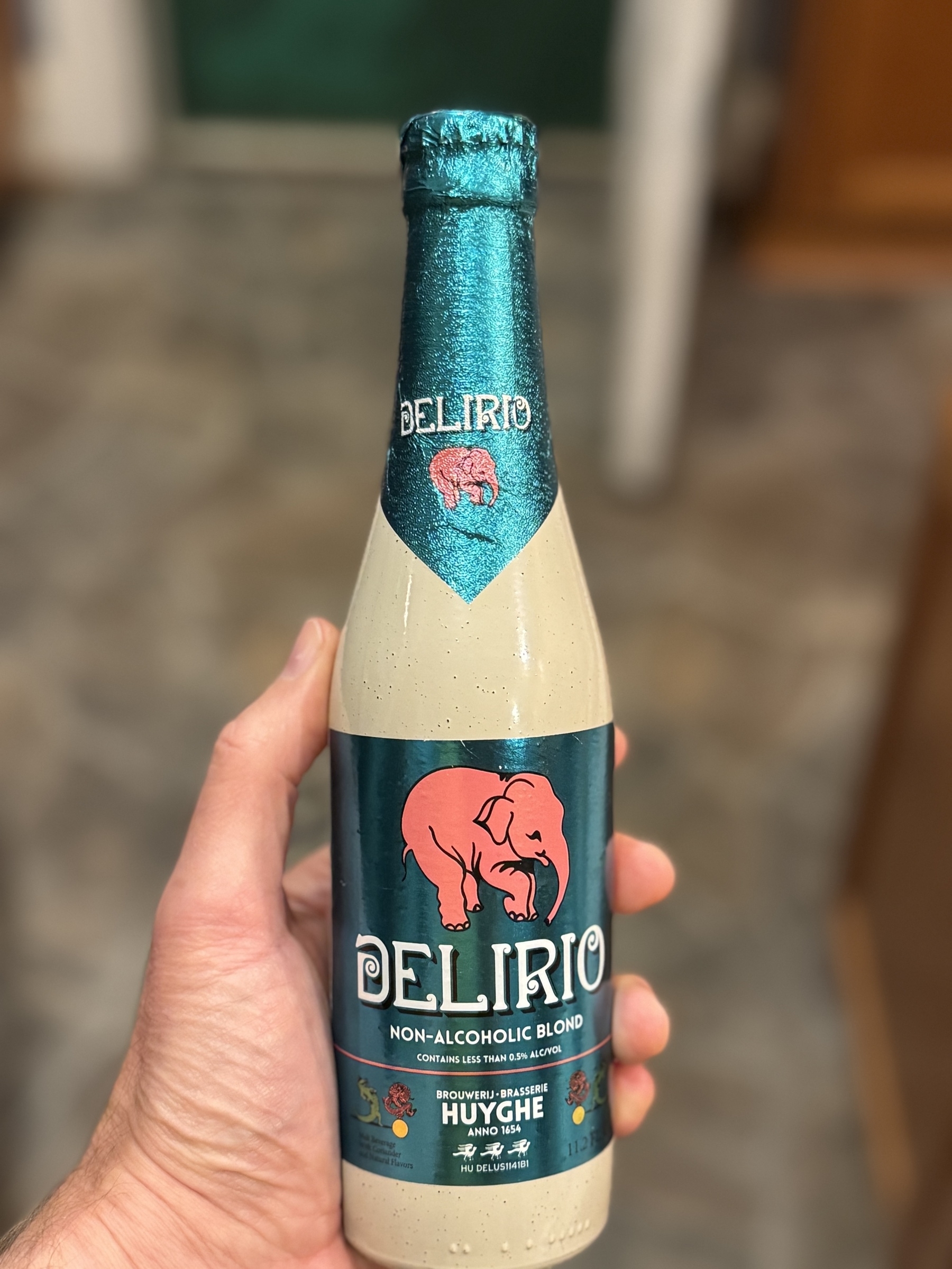 A bottle of Huyghe Delirio non-alcoholic beer.