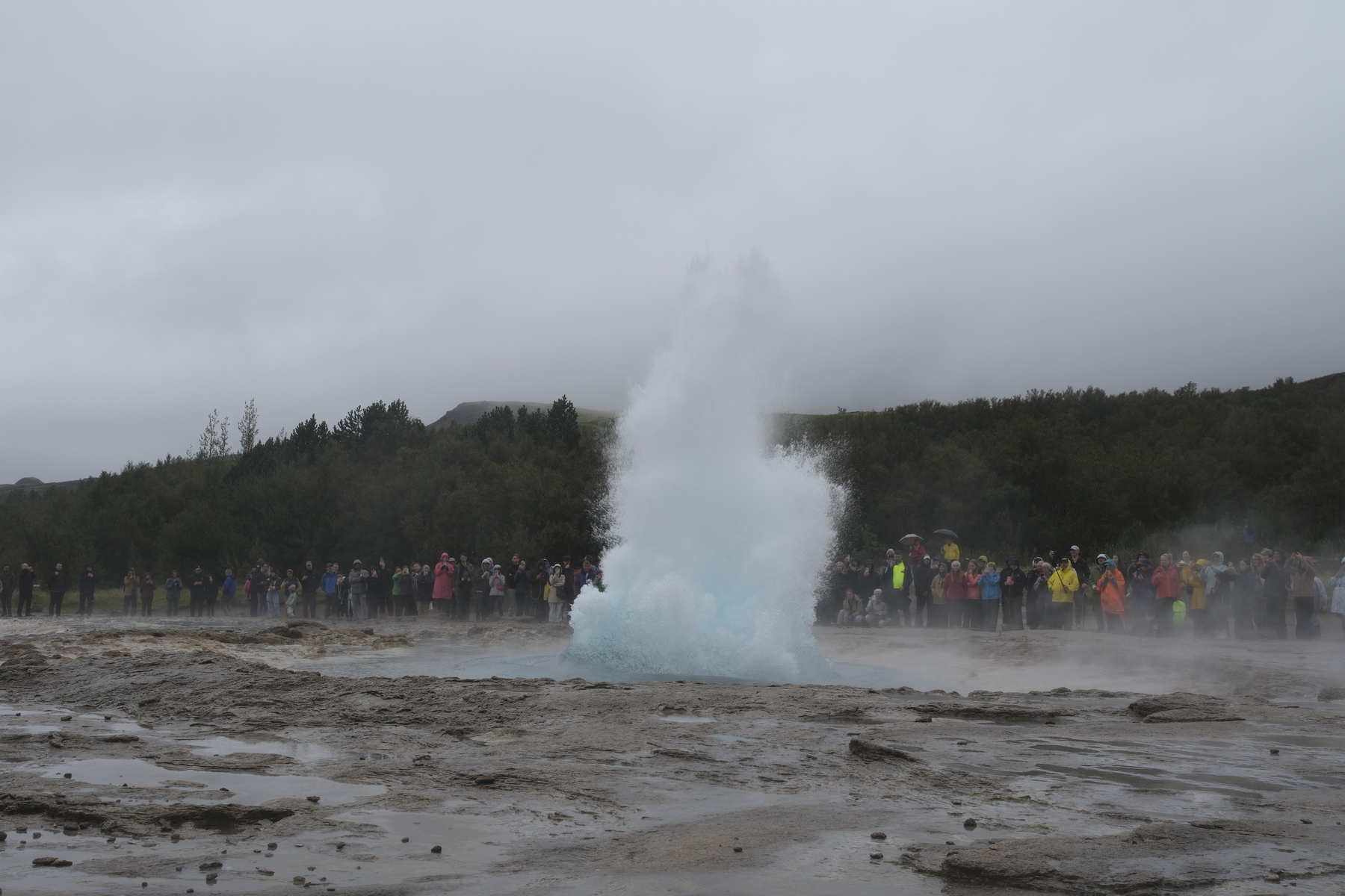 Strokkur geyser erupts.
