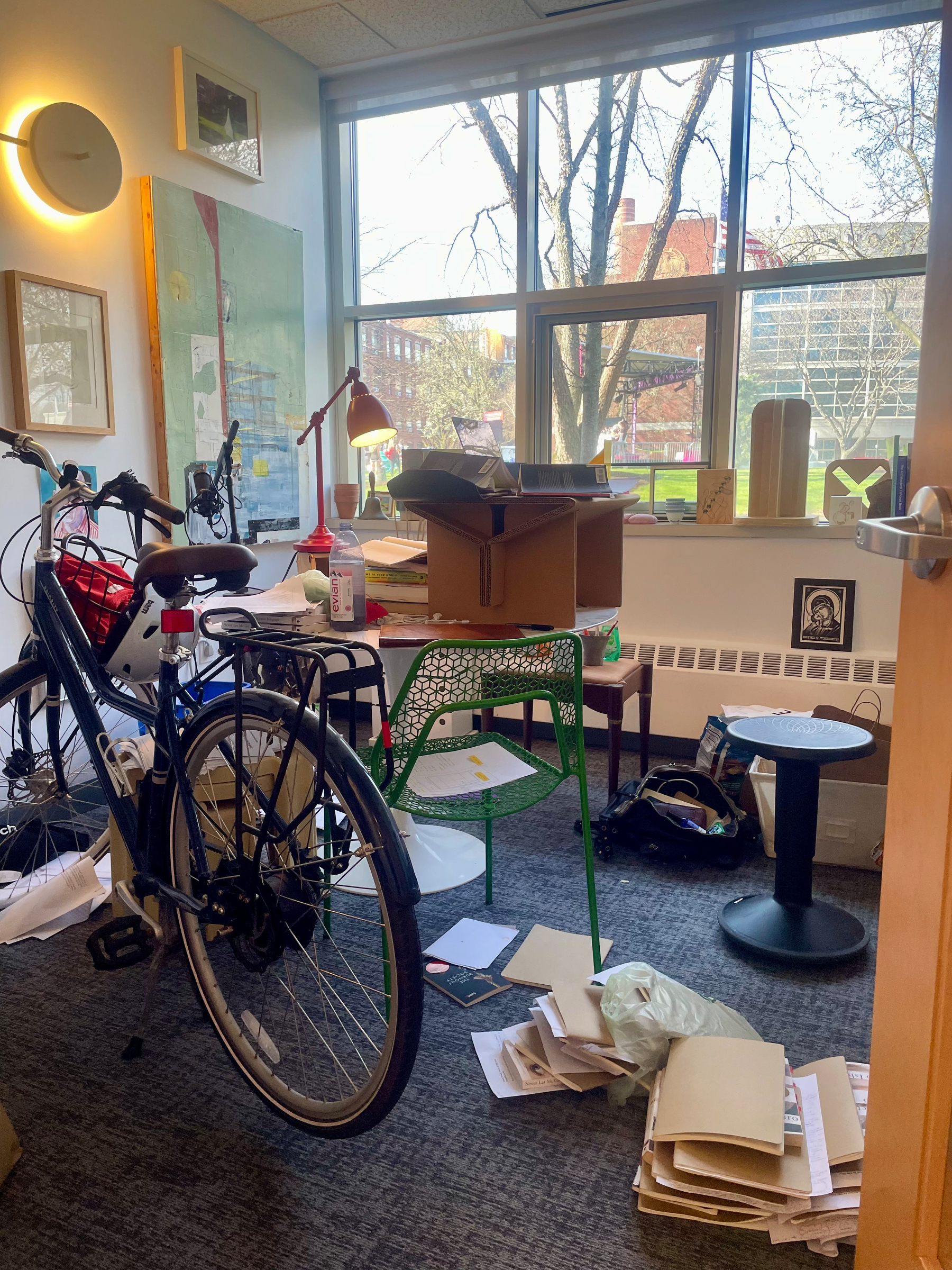 In my office, my bike and desk sit covered in notebooks, book piles, and loose paper detritus in every direction.