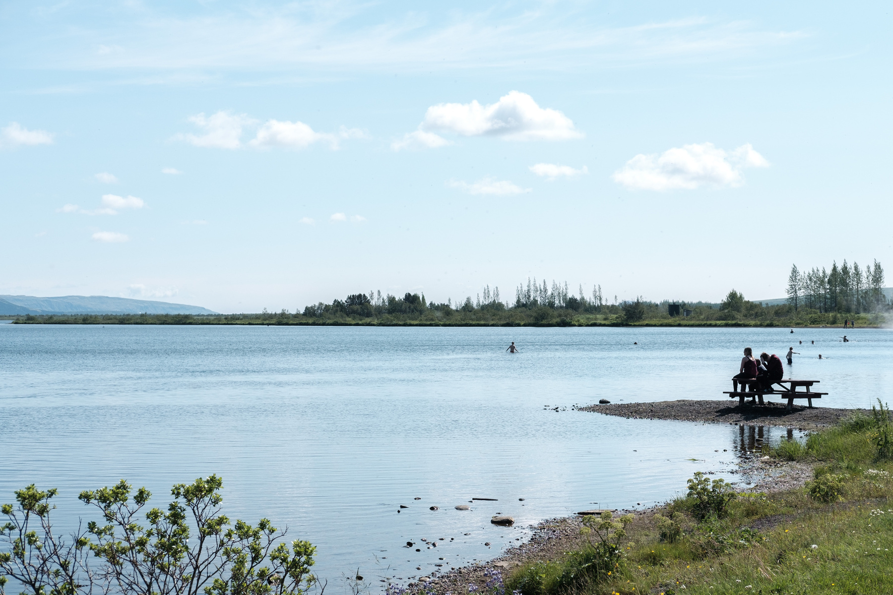 People bathe in the warm Laugarvatn lake