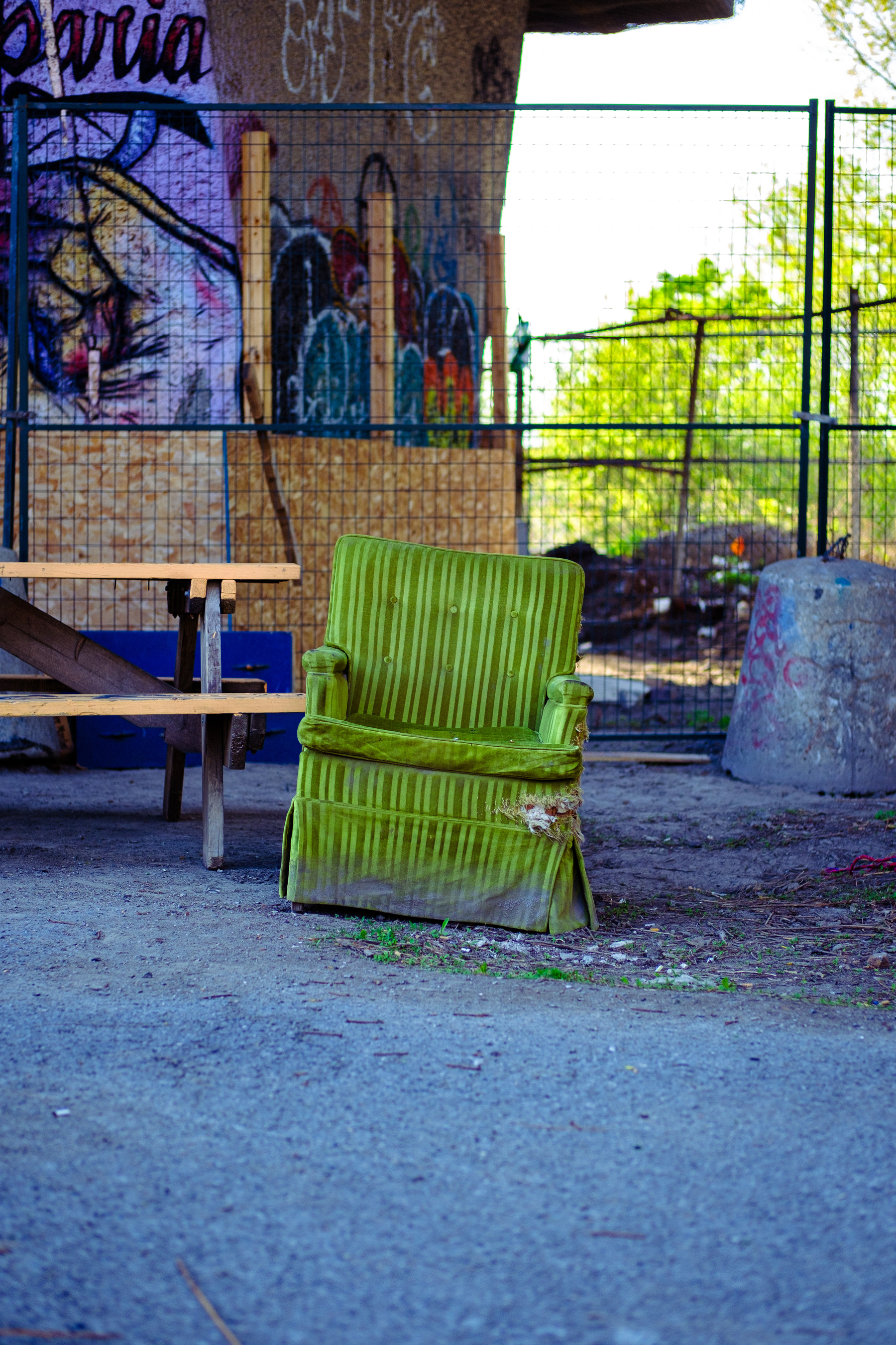 A scruffy discarded chair was left under a bridge in Montreal. It really did have that venomous green look.